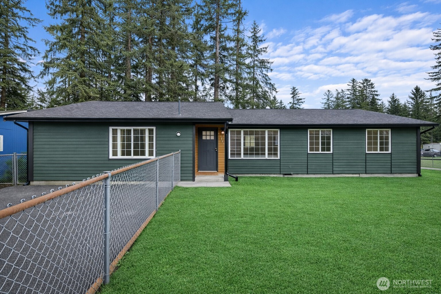 Completely renovated with modern tasteful finishes, this thoughtfully designed home offers the perfect balance of style & functionality Located on a desirable corner lot, it provides privacy, space & flexibility. The home features 3 bedrms, an office & a bonus room w/a layout that feels both efficient & intentional. The primary suite is a true retreat, complete w/direct access to the deck—ideal for quiet mornings or unwinding in the evening. Nearby, an oversized room offers exceptional versatility & can easily serve as a playroom, studio, home office, or additional bedroom. Living spaces feel warm and inviting, highlighted by an electric fireplace & a striking modern feature wall with wood panels and sleek bar lighting, creating a clean, cozy, & contemporary atmosphere. The kitchen is bright & welcoming, featuring new appliances, beautifully selected cabinetry & a timeless modern design suited for everyday living and entertaining.Additional bedrooms are well positioned to allow for comfortable separation of space & privacy.One bedroom features a semi-en suite bathroom, offering added convenience.Outside the spacious backyard provides endless possibilities for recreation, gardening or future projects. A detached 670sqft garage offers excellent space for a workshop, hobby area, or additional storage. Ample parking is available in the driveway, off street & in the backyard.This move-in-ready home combines thoughtful design, modern upgrades & a highly desirable corner-lot setting