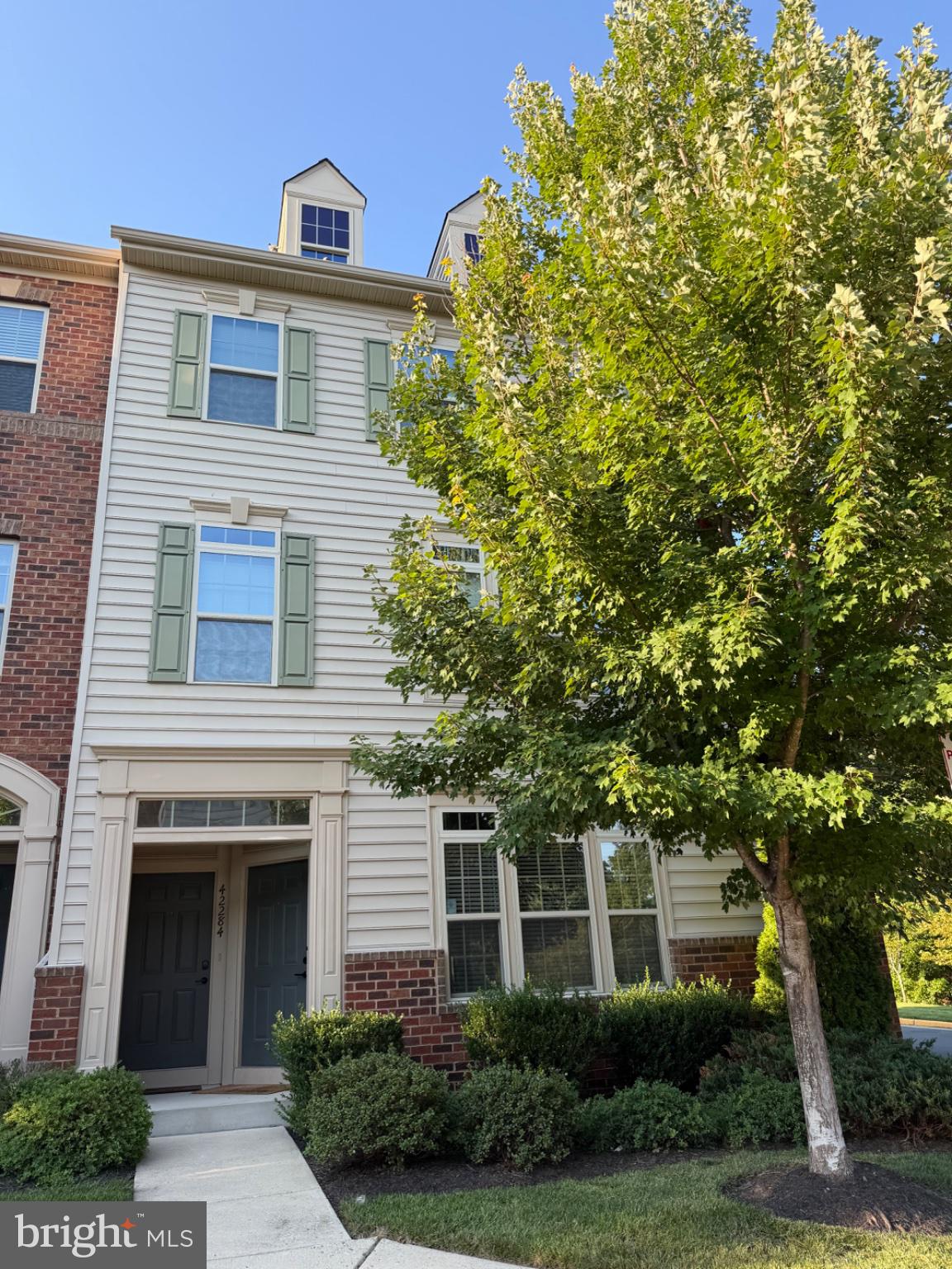 Rarely Available End-Unit Rubens Model — Virginia Manor, Aldie, VAWelcome to this sought-after, single-level Rubens model condo tucked in the heart of Virginia Manor — a beautiful, amenity-rich community in Aldie. This bright and spacious 2-bedroom, 2-bath end unit offers the perfect blend of comfort and convenience, plus a rare one-car garage.Enter from the stairway into an inviting family room filled with natural light. The kitchen impresses with white cabinetry, granite countertops, stainless steel appliances, and a large island with ample seating — ideal for everyday living and entertaining. The primary suite is a true retreat, featuring an en-suite bath with double sinks, a walk-in closet, and a private balcony to unwind on. A full-size washer and dryer add everyday ease.Enjoy resort-style living with community amenities including multiple swimming pools, a clubhouse, and a fitness center.