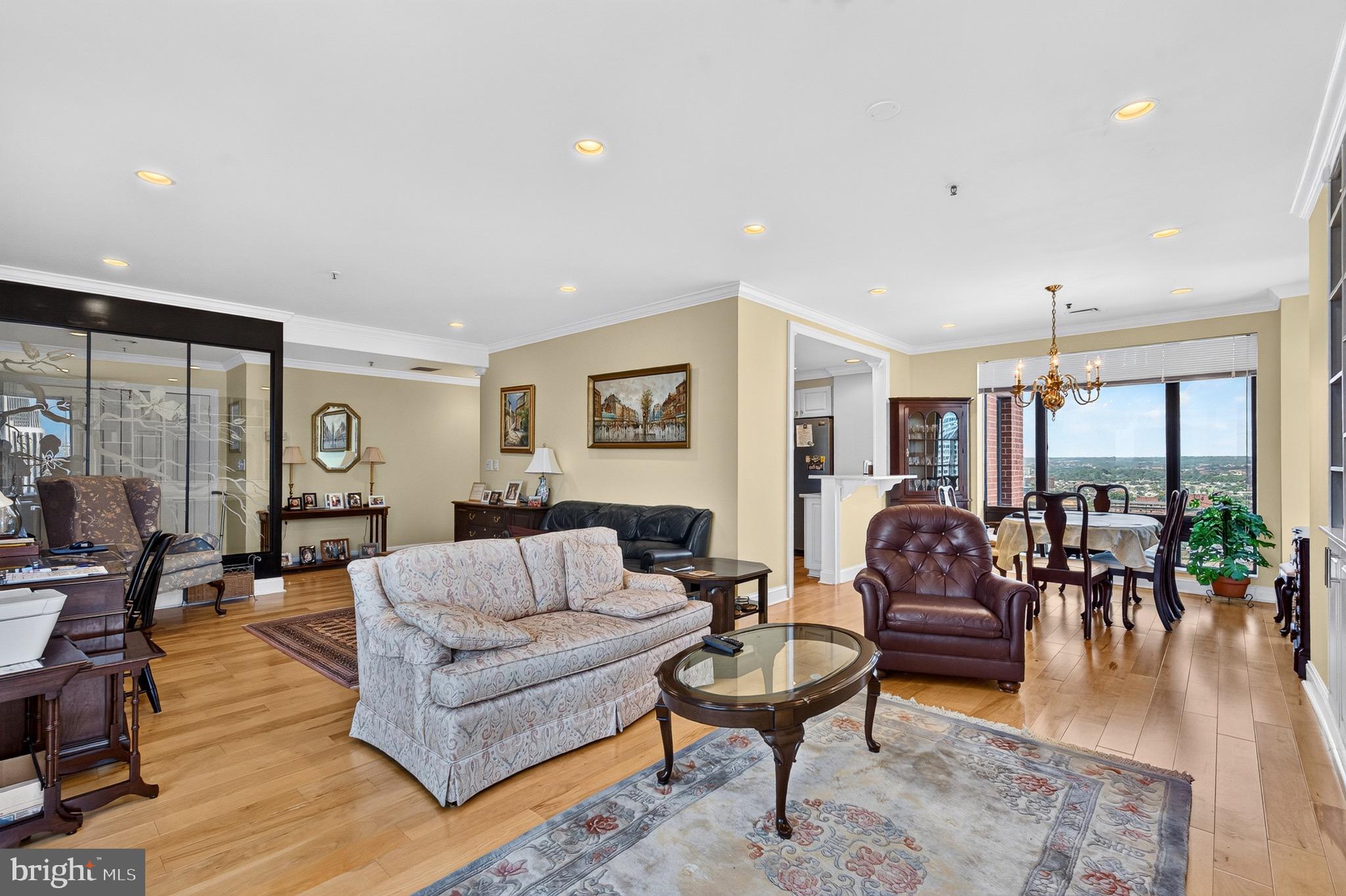 This renovated two-bedroom, two-bath residence at The Towers at Harbor Court offers 1,784 square feet of spacious, open living with exceptional views of Baltimore’s Inner Harbor and both downtown stadiums. The open floor plan takes full advantage of the waterfront setting, while the updated kitchen features stainless steel appliances and flows seamlessly into the main living and dining areas.The Towers at Harbor Court offers 24/7 front desk staff and doorman service, along with deeded parking and private storage. Residents also enjoy direct access to the adjoining hotel, with pool and fitness facilities available through membership. An ideal combination of generous living space, waterfront views, and full-service condominium living in the heart of Baltimore.