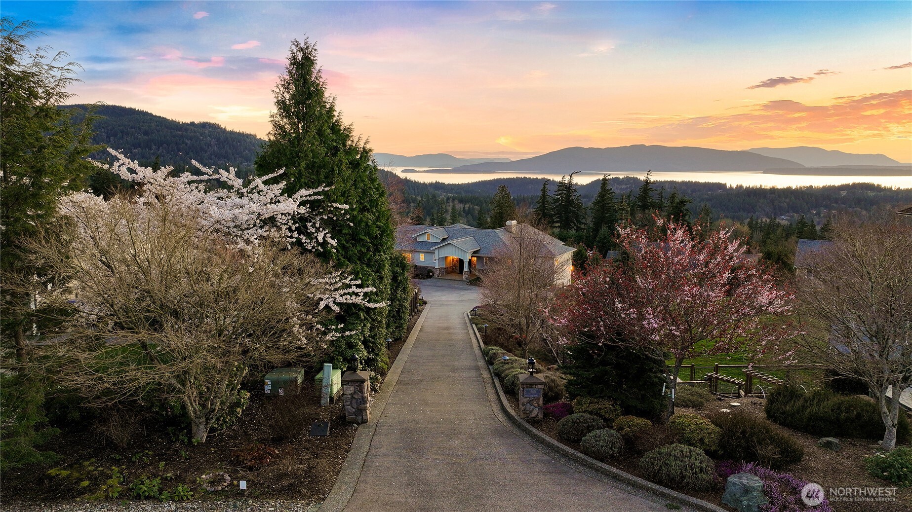 Enjoy forever, endless views of Bellingham Bay and the San Juan Islands from this custom-built home set on a private 3/4 acre lot in the highly coveted & sought after Samish Crest Highlands neighborhood. Three years ago, the owners vacated for a year and spent close to $900,000 dollars on a complete renovation creating the perfect balance between classic and fresh with a light, airy aesthetic incorporating rich design details and refined interiors. Enjoy walls of windows that flood over 6,000 square feet of living space with light & tranquility while the extensive 1,350 square feet of deck & covered patio provide unparalleled outdoor living spaces that are perfect for entertaining. A highly desirable main floor living plan with a chef's kitchen, butlers pantry, two primary suites & the perfect home office while the lower level, accessed by an elevator, has a large entertainment room and 3 additional bedrooms, 2 with baths. In addition, there is over 600 square feet of storage in the home and a large 900 square foot three-car garage. Nothing is missing in this one of a kind oasis, including beautifully manicured gardens and fruit trees. STUNNING & IRREPLACEABLE!