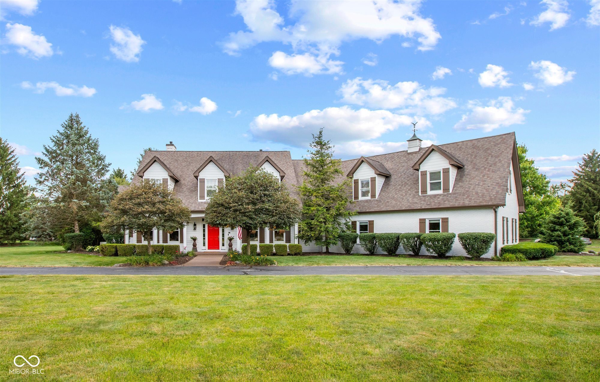 You won't want to miss this stunning, Steve Hoss built, beautiful and artfully decorated estate-style home located on nearly 2.4 acres of prime real estate in Fishers, IN with NO HOA.  This gorgeous resort-like property provides an abundance of living and outdoor space including an additional detached garage space perfect for workshop, craft shop or whatever floats your boat - and even could house your boat!  Inside the main floor you'll find spacious rooms from the stunning entryway, to the gorgeous cook's kitchen leading into a large breakfast space and into the family room, the grand dining room, the beautiful living room, a fabulous office/den and an UNBELIEVABLE GREAT ROOM that will impress even the pickiest individual.  Upstairs features  the spa-like retreat primary bedroom complete with fireplace for those cold winter nights - which will be coming, huge closet and primary bath, 4 additional large bedrooms with 3 additional full baths upstairs.  Off the kitchen you'll find an amazing screened porch overlooking the stunning in-ground pool rounding off the back yard oasis.  Step down into the lower level and find a spectacular rec room space - a great place to watch those Pacers, Fever and Colts! Such an inviting and versatile space! The nearly 1,000 s.f. attached garage is neat as a pin and absolutely pristine.  Just minutes away from Geist Reservoir and all that Fishers has to offer, you will be thrilled to see this stunning property.  Easy access to schools, shopping and downtown Fishers and the Nickelplate District with fine dining, shopping and some of the best ice cream around!  This home exudes pride of ownership and the stunning craftmanship of its premier builder.