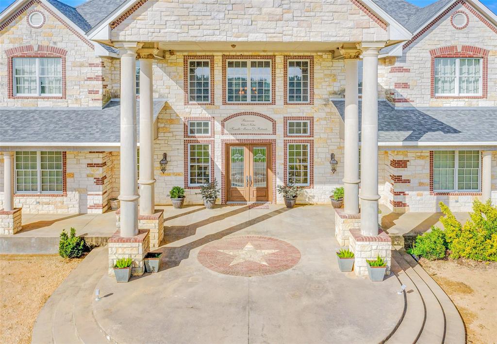 Triple Oaks Ranch in Sulphur Springs, Texas, is an equestrian paradise on 97 Acres  just off I-30, featuring a custom 6,548 sqft home with a grand double staircase entry. The spacious interior includes a chef’s dream kitchen with a 6-burner Dakor gas grill, built-in fridge, flat top grill, and a large island, Upstairs you will find bedrooms, trophy room, a media and game room with a private entertainment theater for enjoying all of the horse shows on the big screen.

The ranch’s horse facilities cater to every equestrians need, starting with the main barn, which boasts 8 stalls (expandable to 10), a wash rack, tack room, hay-feed room, and a Priefert walker. The barn features drains in the center aisle, lights and fans on timers, and a half bath with a washer and dryer.

Additional barns include a second barn with 10 stalls and 5 turnouts, and a third barn with 18 stalls and 6 turnouts. The property also features a 100 x 200 covered, lighted arena with a booth, a 150 x 300 exterior arena, and a ¼ mile oval track.

Extras include a multi-car garage-shop with a 1-1 apartment, hay and tractor storage, a tiny house (384 sqft) under the garage, RV hook ups, and four large stocked ponds. The impressive entry features brick and stone with an automatic iron gate, along with 2,100 feet of pipe fencing along the highway, and underground power servicing the home and barns.

You are 1.5 Hours to Dallas, 2.5 Hours to Fort Worth, 4 Hours to OKC for all the major horse shows. 

Call today to come take a look at this one of a kind horseman's dream in East Texas.