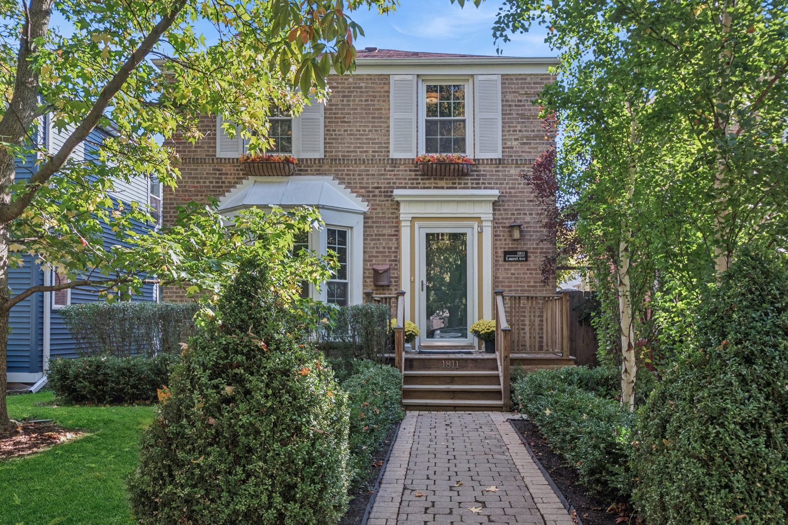 Welcome to 1811 Laurel, a classic brick Georgian. This beautifully updated two bedroom, two bathroom home masterfully blends classic architectural charm with modern touches. The open-concept flow welcomes you into the sun-drenched living and dining areas, framed by oversized windows, hardwood floors and serene garden views. Step into the heart of the home- an exquisitely updated kitchen boasting dramatic granite countertops, stainless steel appliances, custom white cabinetry, a statement faucet with deep farmhouse sink and wine fridge. Whether you're prepping for a quiet night in or hosting a stylish dinner party, this kitchen is equal parts function and showcase. Upstairs, both bedrooms offer generous space, natural light and hardwood floors. The fully updated bathroom provides a spa-like experience with timeless finishes and thoughtful detail. Downstairs, the lower level offers a flexible recreation / media space complete with a gas fireplace & another full bathroom. Laundry and plenty of storage space too! Outdoors, enjoy a fully fenced, beautifully landscaped backyard oasis with mature trees, privacy hedges, and a spacious deck for summer entertaining or morning coffee. Tucked above the garage is a dedicated office or creative studio space -the perfect work-from-home sanctuary. The newer two car garage offers plenty of storage space. The location offers an ease of commute and local amenities. Short driving distance to Central Street Evanston district, downtown Evanston, Robert Crown Community Center & Old Orchard in Skokie. 1811 Laurel offers a rare blend of character, design, and modern livability. Don't miss your opportunity to make it yours.