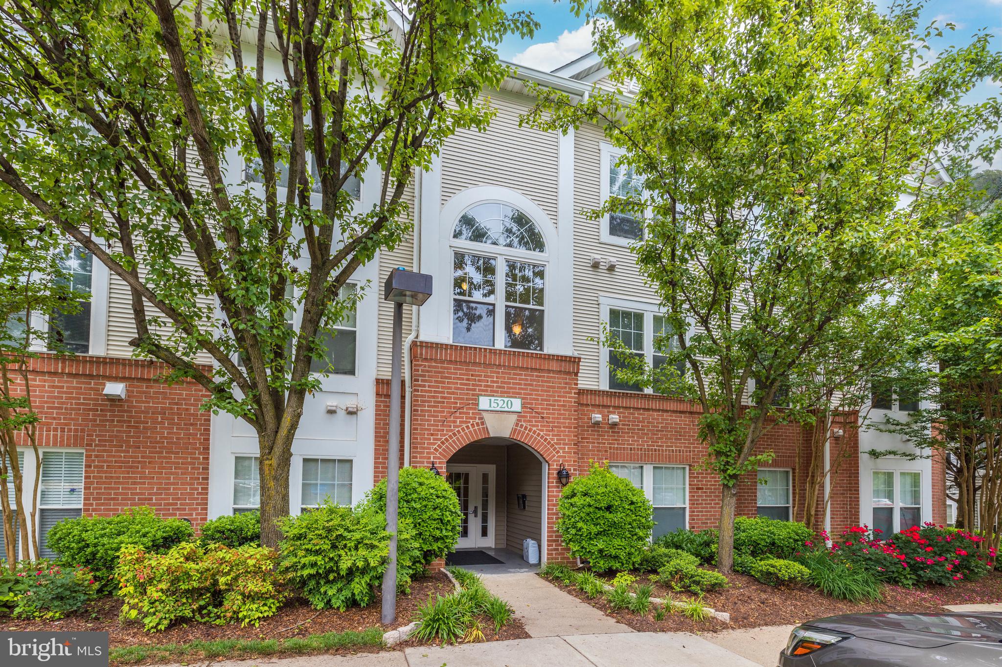 Welcome home to this move in ready spacious 2 bedroom & 2 bathroom corner unit condo located in a secure building with locked front door entry overlooking trees. The inviting foyer greets you and leads you into the spacious great room with ceiling fan & cozy fireplace. Spacious dining room with walls of windows & access to outdoor balcony. Gourmet kitchen with granite countertops, stainless steel appliances & eating area. Spacious primary suite with private bath & walk-in closet with custom built-ins. Second bedroom with walk-in closet also featuring custom built-ins & access to the second full bath. Separate laundry area with full size washer & dryer as well as shelves. Private balcony overlooks trees.  Recently replaced HVAC system, 1 assigned parking space, additional guest parking & more. This condo is privately tucked in the North Point Villa condos & features a car washing station behind the building. Conveniently located near North Point Shopping Center, Reston Town Center, major commuter routes including the metro, dining, entertainment, shopping, schools & much more! Enjoy the amenities of Reston which include pools, pickleball & tennis courts, jogging & walking paths, basketball courts & much more! Interior photos will be uploaded on Friday July 3!