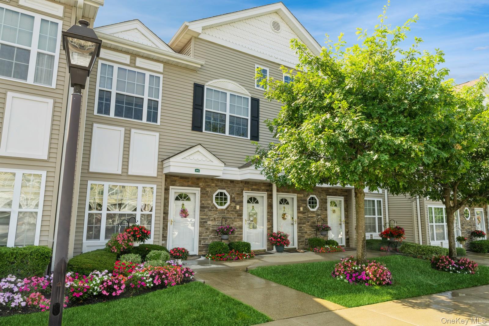 Step into Luxury , Convenience and Community with this beautifully maintained condo at The Seasons of East Meadow which is an over 55 Complex with 24 hour security. If you are looking to downsize, simplify or enjoy a low maintenance lifestyle, this community is the place to be! This "Upper" Unit with a Private Elevator has one of the best locations. The Condo features an open floor plan with vaulted ceilings. Living Room, Dining Room and Kitchen with stainless steel appliances  and hardwood flooring & crown molding throughout. There is a king-sized primary bedroom with ensuite and second bedroom or den with access to a private trex deck. There is also a second bath for guests. Loft area which can be utilized as a guest bedroom, office space, or Den.   There are So many amenities the Seasons has to offer........Indoor and Outdoor pools, Spa, Library, Fitness Center, Movie Theater and Card Room. Conveniently located near Shopping, Restaurants, Parks and all transportation.