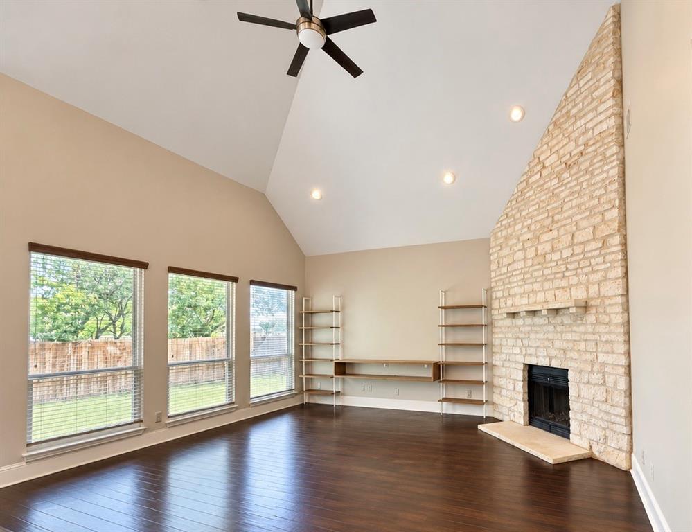 PRICE IMPROVEMENT! Space is the standout here! This North facing West Plano home offers nearly 3,500 square feet with 4 bedrooms, 3.5 bathrooms, a first-floor primary suite, home office, upstairs game room, and no HOA in the Legacy Hills community. Located within Plano ISD, this spacious home offers a highly functional floor plan designed for both everyday living and entertaining.Step inside to soaring vaulted ceilings in the entry and living room that create an open, airy feel filled with natural light. Rich wood flooring extends throughout the living areas and bedrooms, complemented by tile in the bathrooms, there is no carpet anywhere in the home - only easy to clean wood and tile. The main level also includes a formal dining room, eat-in kitchen, and a versatile home office or study.The private first-floor primary suite features a spacious bath with a soaking tub and separate shower. Upstairs, three additional bedrooms offer flexible living arrangements, including two bedrooms connected by a Jack-and-Jill bath and another with its own en-suite bath. An upstairs game room provides additional space for a media room, playroom, second living area, or entertainment space.Outside, enjoy a covered back patio and backyard with room to make it your own. Conveniently located near shopping, dining, entertainment, and major roadways, with easy access to Legacy West, The Shops at Legacy, and Grandscape.If space, flexibility, and a West Plano location with highly rated schools are high on your list, 1720 Endicott delivers it all. The home is now VACANT and EASY TO SHOW—schedule your private tour today!