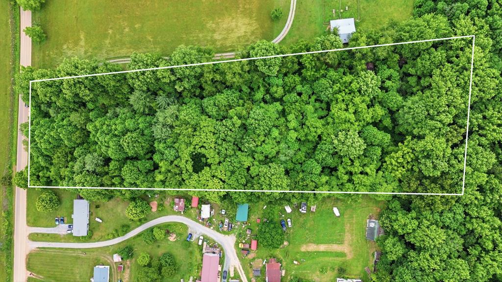 Discover the perfect opportunity to build your dream home or mountain getaway on this beautiful 3.18-acre tract in Washington County, Virginia. This raw land offers a mix of gently sloping to rolling terrain, leading to an elevated building site with stunning long-range views. Once cleared and home to an old tobacco barn, the property is ready for your vision while retaining its rural charm. Public water is available, adding convenience for future development. Outdoor enthusiasts will appreciate the property's proximity to the National Forest, providing endless opportunities for hunting, hiking, and recreation. Located just a short drive from the Trail Town of Damascus, VA, this property combines peaceful country living with easy access to outdoor adventure, local amenities, and one of Southwest Virginia's most desirable locations. Don't miss this chance to own a scenic piece of Virginia countryside with incredible potential.