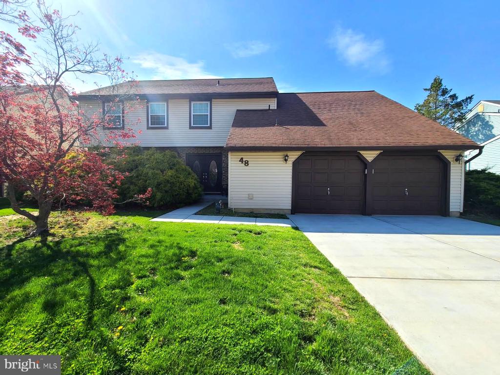 Owner is downsizing. Extremely rare opportunity to own the largest model (Ashfield) in the highly sought-after Birchfield development full of parks, walking paths, lakes and a clubhouse with gym, swimming pool and many other amenities. Not only is this home in a prime location of a renowned school district, it's located within a quiet cul-de-sac waiting for a new family to make their own happy memories. Lovingly maintained by the original owner, this beautiful home offers over 2,500 square feet of living space with a double door entryway into a large foyer, powder room, closets, formal living room, formal dining room, spacious eat-in kitchen with stainless steel appliances and open concept to the massive sunken family room with vaulted ceiling, wood beams, floor-to-ceiling wood-burning fireplace and french patio doors to the oversized Trex deck overlooking the spacious backyard perfect for the kids to play. There's also a laundry room with sink that offers direct access to the 2-car attached garage. Upstairs, you will find 4 very large bedrooms (each with extremely huge closets) including a primary suite with a walk-in closet, a linen closet and a full bathroom with dual sink vanity. An additional full bathroom, additional linen closet and a large balcony overlooking the family room complete the second floor.  This home is being sold as-is and buyer is responsible for certificates. Inspections for informational purposes only.  Appliances are included.
