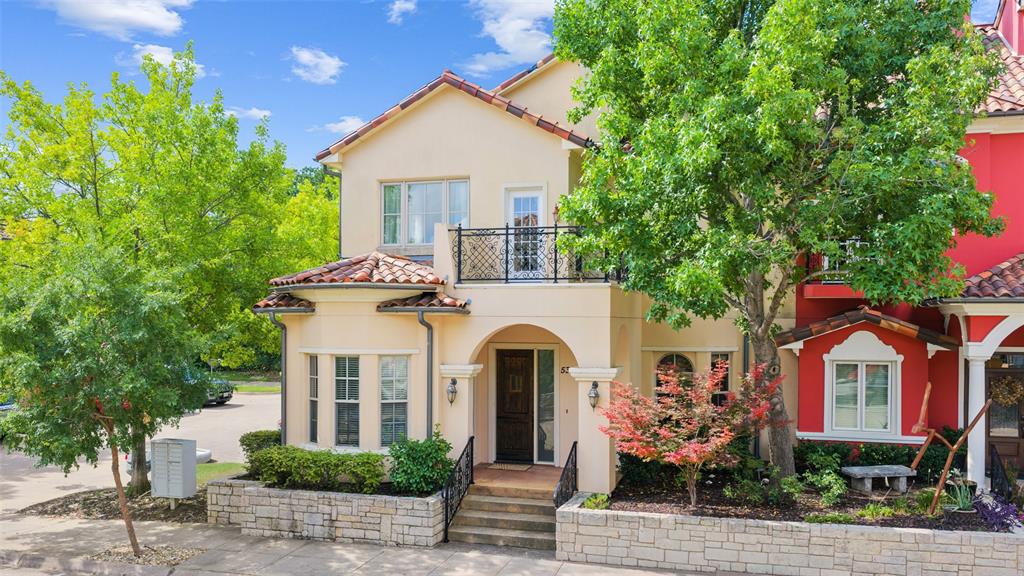 Experience refined living in this exceptional Mediterranean-style villa located in the prestigious Village at Colleyville. Offering 4 bedrooms, 3.1 baths, and 3,214 square feet, this thoughtfully designed residence combines timeless architecture with custom designer finishes, rich hardwood flooring, and the rare convenience of private guest quarters with its own entrance, kitchen, and full bath. A welcoming foyer leads into elegant living spaces highlighted by soaring ceilings, arched openings, crown molding, and abundant natural light. The inviting living room features a striking fireplace flanked by custom built-in shelving. The gourmet kitchen showcases granite countertops, a gas cooktop, dual ovens, stainless steel appliances, and extensive cabinetry, all opening seamlessly to the breakfast area and formal dining room. A private office provides the ideal work-from-home setting, while a well-appointed utility room with built-in cabinetry and sink, along with a convenient powder bath, adds everyday functionality. The luxurious primary suite offers a sitting area with private patio access and a spa-inspired ensuite featuring dual vanities, soaking tub, an oversized glass-enclosed shower, and a spacious walk-in closet. Upstairs, a second living area with a wet bar, fireplace, and doors leading to a balcony overlooking the charming community streetscape. Two generously sized secondary bedrooms share a Jack-and-Jill bath. Adding exceptional flexibility, the separate guest quarters feature a private exterior entrance, kitchen, and full bath—perfect for guests or multigenerational living. Residents of the Village at Colleyville enjoy exclusive amenities including a community pool, fitness center, clubhouse, and walking paths, all just moments from premier shopping, dining, and entertainment. Ideally located, this exceptional residence offers the perfect blend of luxury, comfort, and low-maintenance living in one of Colleyville's most desirable communities.