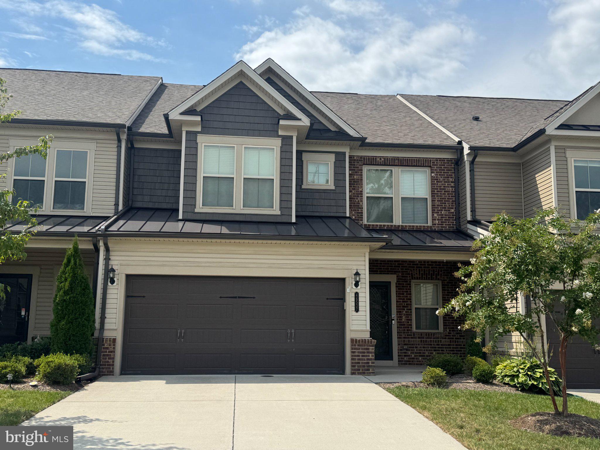 Welcome home to this beautifully maintained Pulte built home in the desirable Lexington 7 active adult community of Ashburn! The oversized front porch greets you as you arrive at this stunning home. The inviting foyer greets you with upgraded wide plank flooring that extends through the entire living area. Gourmet kitchen with upgraded white cabinetry, granite, undercabinet lighting, pantry & spacious island. The open concept living space features a spacious dining room with upgraded light fixture & large great room with gas fireplace & coffered ceiling. The main level primary features upgraded wool carpet, custom window treatments, tray ceiling with detailed molding, large walk-in closet & luxurious bath with oversized walk-in shower. Upgraded powder room, laundry room with sink & cabinets as well as a private office/den/hobby room complete the main level. The upper level features a large recreation room, two spacious secondary bedrooms with large closets, second full bath with dual sinks & a large storage room! The private rear yard is fenced and features an expansive patio with water feature & mature landscaping. The two car garage features epoxy floor & overhead storage. Sought after location in the front of the community with a view of wooded common area from the front of the home & tons of guest parking nearby. This active adult community features pickleball court, walking trails & social events! Incredibly located near One Loudoun, Belmont Chase as well as other local shopping, dining & entertainment venues. Photos will be uploaded on Thursday September 10!