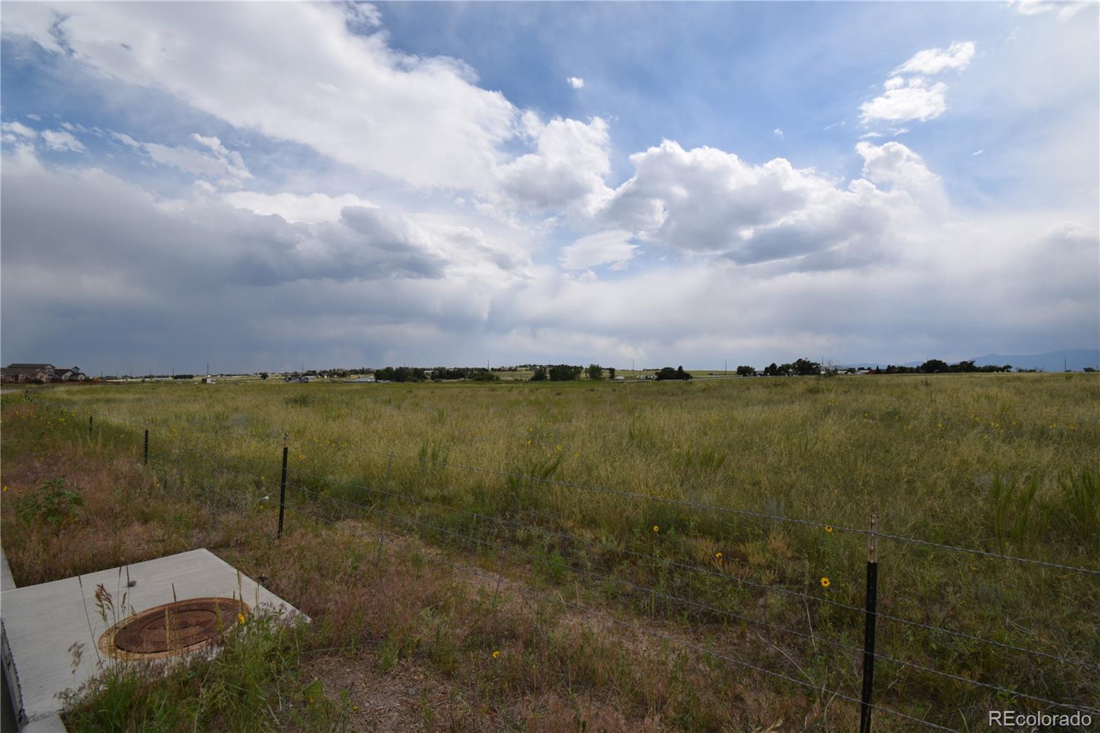 Desirable property located at major crossroads exiting Colorado Springs before entering Falcon, CO. Property is located within Colorado Springs city limits. Lots of options with this property. It had previously been zoned R/CR - so there is potential to be able to go commercial with this property.