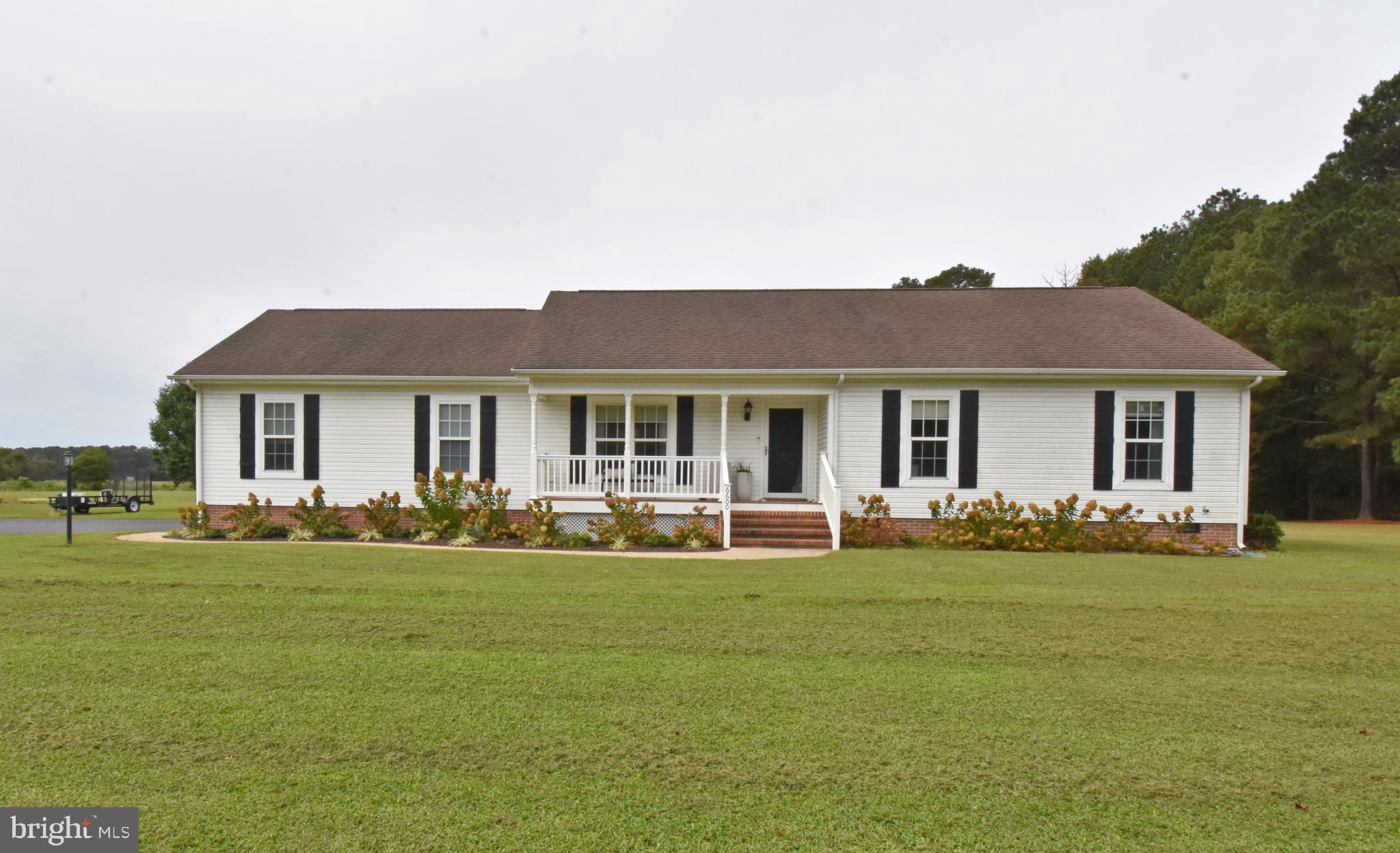 Discover the perfect blend of modern updates and cozy living at 6600 Old Westover Marion Rd that offers a total of 6.06 acres - with 3 acres across the street! This 3-bedroom, 2-bathroom home spans 1,208 sqft and offers an inviting open-concept layout designed for both relaxation and entertaining. Step inside to find a bright and airy living space, where a wall was recently removed to create an effortless flow. The living room features a stylish electric fireplace, while the outdoor patio expands your living area for gatherings and quiet evenings alike. The kitchen is a showstopper, boasting granite countertops, a farmhouse sink, and newer appliances including a refrigerator and oven. Throughout the home, you’ll love the high-end plank flooring, updated bathrooms, and thoughtful details that make the space move-in ready. Practical upgrades add peace of mind, including a new AC unit, a washer and dryer just two years old, and refreshed landscaping that enhances curb appeal. For pet lovers, an invisible fence surrounds approximately one acre of the property, providing both safety and freedom. Move-in ready and beautifully updated, this home offers modern living in a peaceful setting. Schedule your showing today!