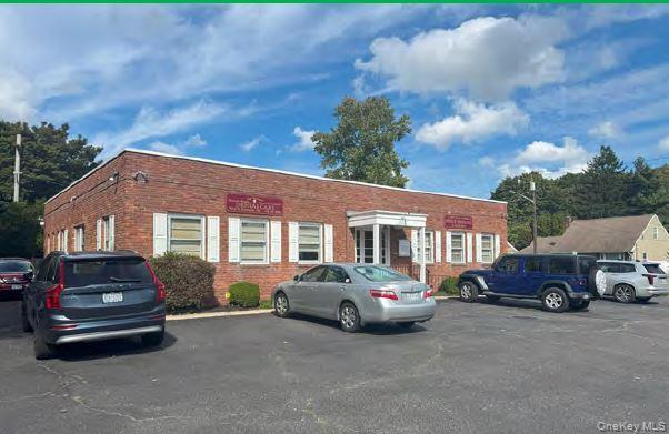 This 2,688 square foot commercial building, with a full partially finished basement, is being sold as an investment property only. ADA compliant with rear exterior ramp, one gas hot air boiler, 4 separate electric meters with 2 CAC compressors, and 15 parking spaces. There are 3 Tenants with lease options extending out to 2,038. Tenants pay their own electric for their suite. Landlord pays annually for landscaping: $2,400, insurance: $4,815, cleaning of common area: $1,200 and 10.5% of property taxes-common area PSEG-gas & hot water (1 boiler)-snow removal-water-cesspool pumping & maintenance- annual fire inspection fee-RPZ backflow inspection fee- and parking lot sealing & striping maintenance, and 60% of garbage dumpster.Annual Tenant Income is $101,023 - Landlord Annual Expenses are $10,352. NOI: $90,671All expense amounts provided are estimates only and may vary based on actual costs incurred. Tenant #1 is a Dentist with 935 square feet: current rent is $2,532/month & $30,384/year plus annual expenses: 40% of gas & hot water: $1,195, 40% of PSEG common area: $2,184, 40% of tax bill: $5,796, 40% of water: $120, 40% of snow removal: $520, 40% of garbage: $922 and 40% of annual RPZ backflow device inspection charge: unknown amount, 40% of cesspool pumping & maintenance: unknown amount, 100% of annual fire inspection fee & fire extinguisher: unknown amount. Total 2025 rent is: $41,121/yr -$3,427/month. Current lease term is 1/1/2023 to 12/31/2032 with a 5-year option ending 12/31/2037.Tenant #2 is Long Island Stuttering & Speech Pathology Center with 935 square feet: current rent is $3,004/month & $36,048/year plus annual expenses: 37.5% of gas & hot water: $1,121, 37.5% of PSEG common area: $2,048, 37.5% of tax bill: $5,433, 37.5% of water: $42, 37.5% of snow removal: $488, 37.5% of annual RPZ backflow device inspection charge: unknown amount, 37.5% of cesspool pumping & maintenance: unknown amount, & 37.5% of annual fire inspection fee & fire extinguishers: unknown amount. Total 2025 rent is: $45,180/yr -$3,765/month. Current lease term is 6/1/2022 to 5/31/2031.Tenant #3 is Social Worker with 364 square feet: current rent is $981.45/month & $11,777/year plus annual expenses: 12% of gas & hot water: $359, 12% of PSEG common area: $655, 12% of tax bill: $1,739, 12% of water: $36, 12% of snow removal: $156, 12% of annual RPZ backflow device inspection charge: unknown amount, 12% of cesspool pumping & maintenance: unknown amount, & 12% of annual fire inspection fee & fire extinguishers: unknown amount & 12% of parking lot sealine striping maintenance. Total 2025 rent is: $14,722/yr -$1,227/month. Current lease term is 1/1/2026 to 12/31/2028 with a 3-year option ending 12/31/2031The building is located on the northwest corner of Pulaski Road and Irving Johnson Street in the Hamlet of East Northport. The parcel has 10,890 sf/.25 acre and is rectangular in shape with 108+feet of frontage along Pulaski Road and 127+feet of frontage along Irving Johnson Street. Dentist has 936 SF, Speech Pathologist has 936 SF and Social Worker has 364 SF with a common hallway with 452 SF. Individual electric meters for each tenant and individual HVAC systems for each tenant and 1 meter for gas hot air heat.