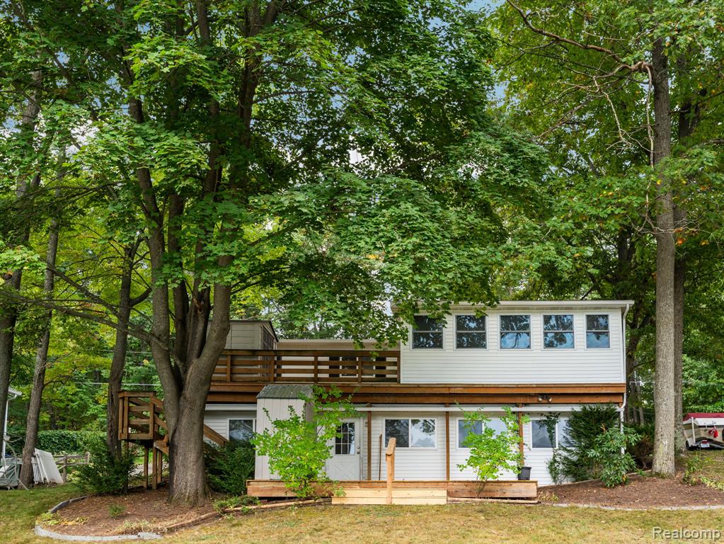 Back on the Market! Someone else’s loss is your gain—repairs have been completed, and this beautiful home is ready for a new owner. This spacious 1,600+ sq ft ranch features a finished lower level offering potential rental income or extra living space. Located on all-sports Little Long Lake, you’ll enjoy 60 feet of private water frontage with a seawall and dock included all in a peaceful, park-like setting. Recent updates include two new decks and a new roof, a new garage door and some updated electrical. The property also offers ample parking with a detached garage and three storage sheds. Inside, you’ll find a luxurious jetted tub in the lower-level bath, perfect for relaxing after a day on the lake. Whether you’re looking for a year-round residence or a weekend getaway, this home provides comfort, convenience, and stunning lake views. Situated on the quiet end of the lake with great fishing and close to town, this is a fantastic opportunity—call today to schedule your private tour!