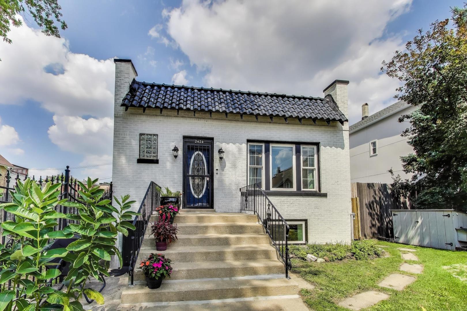 One-of-a-kind single family home on a double lot in community centered Tri-Taylor! This 100 year old home has been lovingly rehabbed into a thoughtfully functional residence, maintaining it's original charm and embracing modernity. The entire main level has refinished hardwood flooring beginning within the foyer, which still contains an original 1923 safe embedded into the brick and flows beautifully into the bright living room. The dining area and kitchen can be configured a number of ways, but most importantly, the storage, counter space, and updated appliances make these two rooms perfect for both daily living and entertaining! Additional pantry/storage is tucked away with the first floor bath and a flex room/closet abuts the living room for whatever use you might need! One south facing bedroom is located off the foyer and has a built-in Murphy bed for added space and convenience. Downstairs was entirely reconfigured to accommodate a large primary bedroom and walk in closet, additional bedroom and rec room! An absolutely gorgeous marble tiled second bath with deep tub and heated floors and side by side laundry finish off the living space. Recessed lighting was installed throughout the home in 2021. On to the yards, yes yards! Off the kitchen is a deck, paver patio, and garden beds! Treat yourself and your green thumb to a myriad of homegrown fruits and veggies! If that's not your thing, the side lot is ready for your customization! The 2.5 car garage has newer rubberized roof shingles which are durable, long lasting, and environmentally friendly. The improvements to this home include updated sewer lines, plumbing, electric, HVAC, insulation, windows, modified bitumen membrane and aluminum roof coating, and a high end Aquasana water filtration system. Tri-Taylor gives you great access to world class medical facilities, the United Center and the upcoming 1901 entertainment project, Douglass Park, the Lions for Hope field house, highway proximity, and plenty of grocery stores, restaurants, and retail. Sold AS IS.