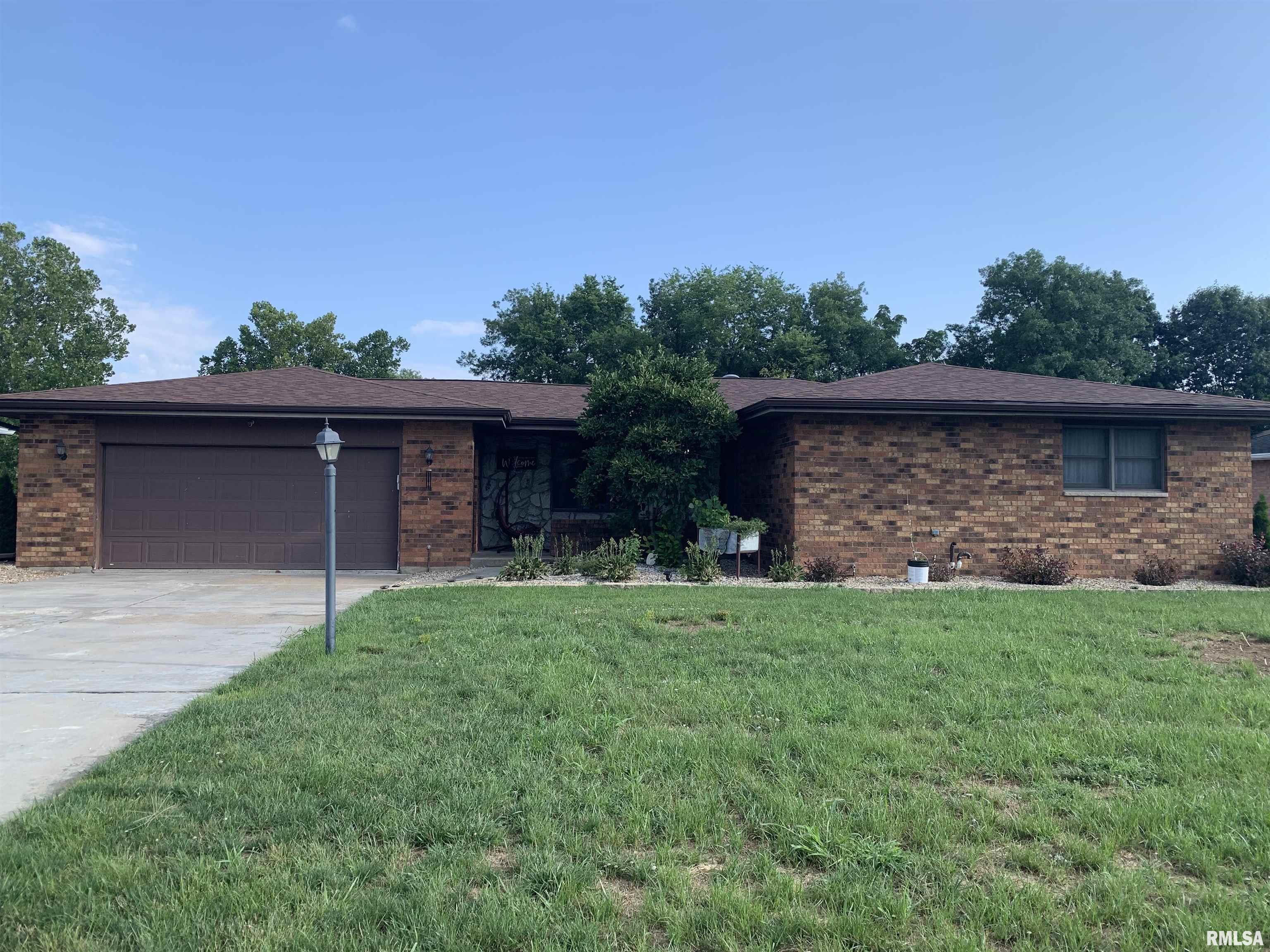 COMING SOON!  Attractive 3–5 bedroom brick ranch in a desirable south-side location! This brick beauty has a great main floor layout leading out to a deck overlooking the beautiful backyard with patio, gazebo and firepit area!  Well maintained home with updated bathrooms in ’25 & ’26. Large primary bedroom offering more space, if you have large size furniture!   Basement offers additional two rooms used as bedrooms (no egress), family room plus a wet bar with refrigerator conveying and stools that can convey. Insulated two-car garage includes window A/C and heater.  Two sheds will convey.  Chicken house and chickens will be removed. Lagoon fee: $45/qtr.  Great indoor and outdoor space for entertaining! Closing to be after 10/15/26. (Photos uploaded on 8/25/26)
