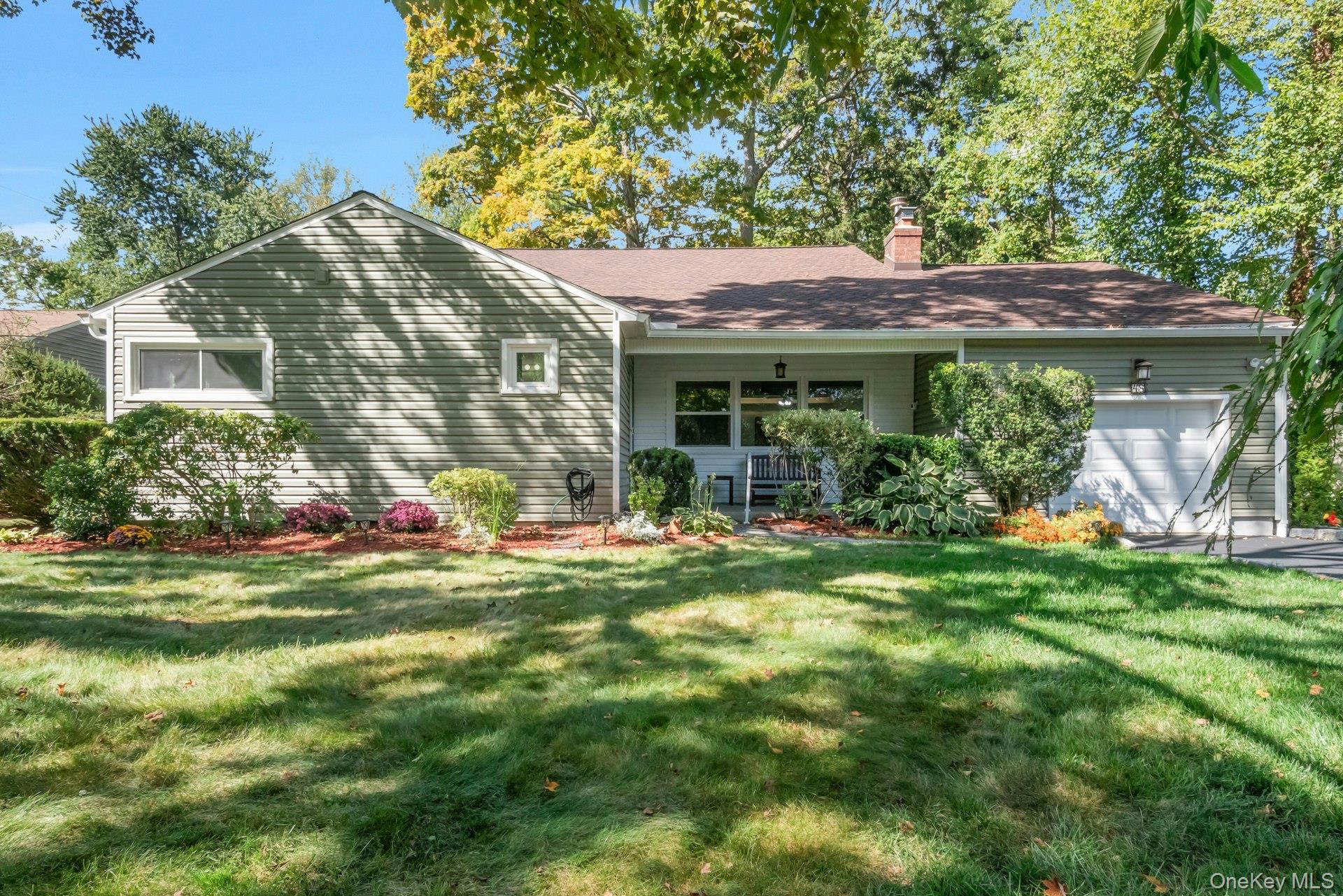 Welcome to this beautifully maintained 5-Bedroom, 3-Bath expanded ranch-style home – the perfect blend of convenience, comfort, and natural beauty.
Step inside and be greeted by refinished hardwood floors flowing seamlessly through the living room, dining room, and home office. The sun-filled family room with its dramatic cathedral ceiling opens to a level, expansive backyard – an outdoor retreat ideal for entertaining, birdwatching, or relaxing year-round.
The versatile layout offers both open gathering spaces and private retreats. At the heart of the home, the thoughtfully designed chef’s kitchen boasts engineered stone countertops, KraftMaid 42” custom cabinetry, stainless steel appliances, and smart Wi-Fi-enabled oven and refrigerator. Imagine cozy nights by the fireplace, hosting friends, or making s’mores with loved ones. The main level features a primary suite with private bath, plus two additional bedrooms and a full bath. Upstairs, find two more bedrooms and another full bath – perfect for guests, a home office, or flexible multigenerational living. Natural light fills nearly every room, creating a warm and cheerful atmosphere throughout the day. This home has been carefully updated with a new roof, vinyl siding, energy-efficient windows, and a brand-new hot water heater. A large-capacity washer and smart dryer add modern convenience.
Set in a desirable neighborhood just minutes from local parks, hiking trails, top-rated schools, shopping, dining, and commuter routes, this home offers the lifestyle you’ve been searching for.
