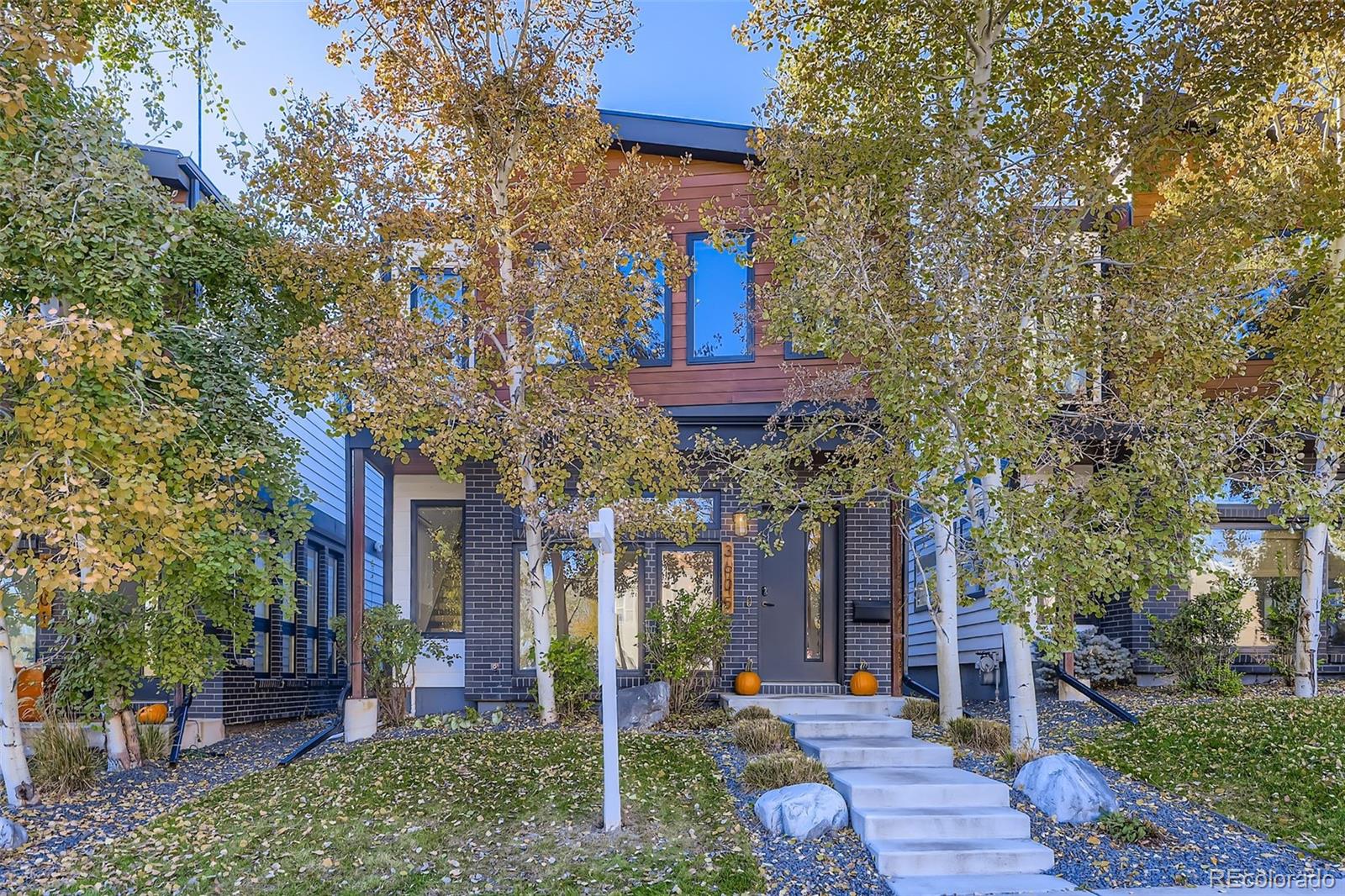 Amazing opportunity in the heart of Lohi! This modern home designed and built by Workshop Denver, one of Denver’s premier builders, offers all the best of single-family living. Not a square foot is wasted as you enter the light filled designer chef’s kitchen. The 17 foot island embraces the European cabinetry, quartz countertops, custom tile and Bertazzoni 5-burner gas range, separate full Electrolux refrigerator and freezer. Site finished hardwood floors expand the first floor perfect for entertaining with a custom glass roll-up garage doors connects the indoors to the covered deck and backyard. The second floor contains a primary suite with a spa-like 5 piece bath and walk-in closet; 2 additional generously sized bedrooms with en-suite baths and a hall laundry. The third floor is vaulted and allows for a multitude of uses. Enjoy the oversized rooftop deck and lounge taking in breathtaking city views, the stars, and proximity to all the Michelin stars in the LoHi area. This is one of the best locations to access world-class restaurants, coffee shops, shops and breweries.