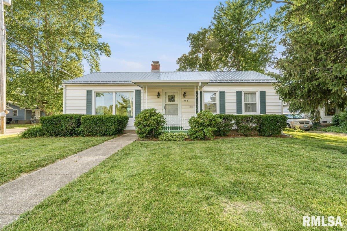 Back on the market due to no fault of the seller and at a great new price! Within walking distance of HyVee and Washington Park This 3 bedroom 2.5 bathroom home is on a corner lot nestled in one of Central Springfields nicest neighborhoods. With approximately 2000sq' of finished living space and tons of storage space in the unfinshed area of the basement along with a large attached 2 car garage you will love making this house your home. Some of the more noteworthy updates and features include: HVAC, water heater heater new in 2021, replacement windows 2019, Steel roof in 2010, front porch roof in 2023, side patio roof in 2018, newly sealed driveway June of 2026, New Washing machine in 2026 and dryer less than 2 years old, hardwood floors under much of carpet, pull down weighted attic stairs, main floor laundry, 6 panel doors, french doors, ceiling fans, living room dining room combo with built in china cabinet, partially finished basement with game room/tool bench/half bath, Sprinkler system (not currently in use), underground downspout extensions, backkup sump pump, extra parking on blacktop area in front of home, updated electrical service panel, gutter guards, side and back patios, vinlyl siding and much more! Call your favorite Realtor today to schedule a tour of this great home!