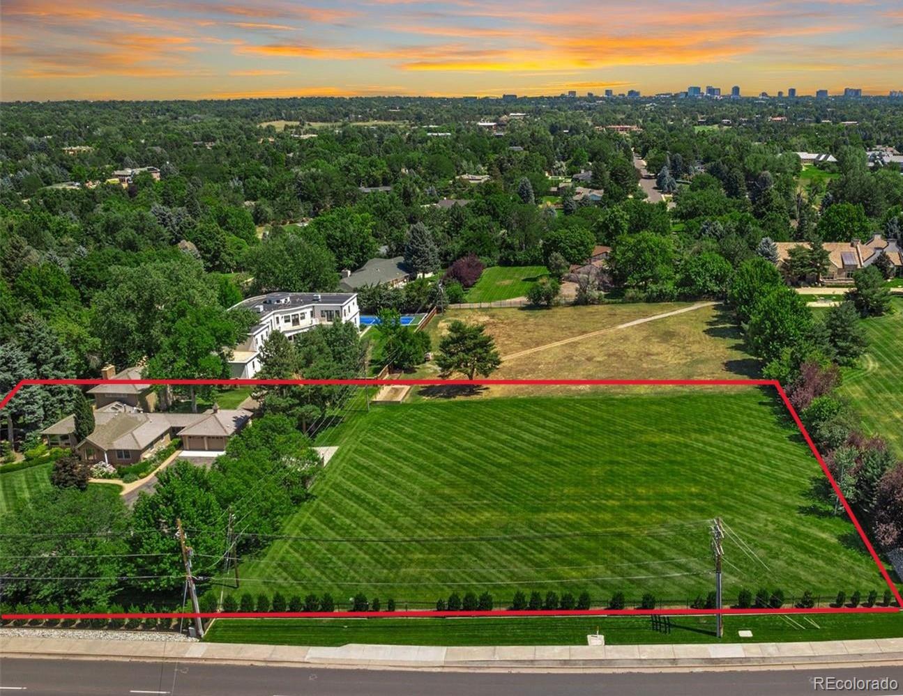 * This listing is for the house at 4600 S University AND the lot next door at 4650 S University, just over 2 acres combined* Get ready to fall in love with this wonderful home on a gorgeous lot in Cherry Hills. The land value alone makes the purchase price worth it whether you are planning to live in the move-in ready house or redevelop and build your dream home. Fantastic tilework and gleaming hardwood floors greet you as you enter. Ample windows provide views of the stunning landscaping that surrounds the house. Cook up gourmet meals on your Viking range while prepping on quartz counters. Enjoy fresh vegetables grown in the detached solarium. Your guests will relax in style in the spacious family room complete with wet bar. Your BBQs will be memorable when you entertain in the big yard surrounded by mature trees and beautiful flowering bushes. Cozy up with the family by the fireplace on those chilly nights. The large finished basement is the perfect place to create your lady lounge, man cave, home theater or play place for the kids. Relax away the stress of the day when you retreat to your huge primary suite located upstairs for ultimate privacy. You'll never tire of gazing at the mountain views from your bedroom window. The garages are connected by a breezeway to keep you out of the elements and features a workshop/office flex space. The larger barn style garage is massive with plenty of room for all your yard toys. Just minutes to world-class shopping and dining in the Denver Tech Center and The Streets At Southglenn. Close to Fiddler's Green, parks and trails as well! Welcome Home!