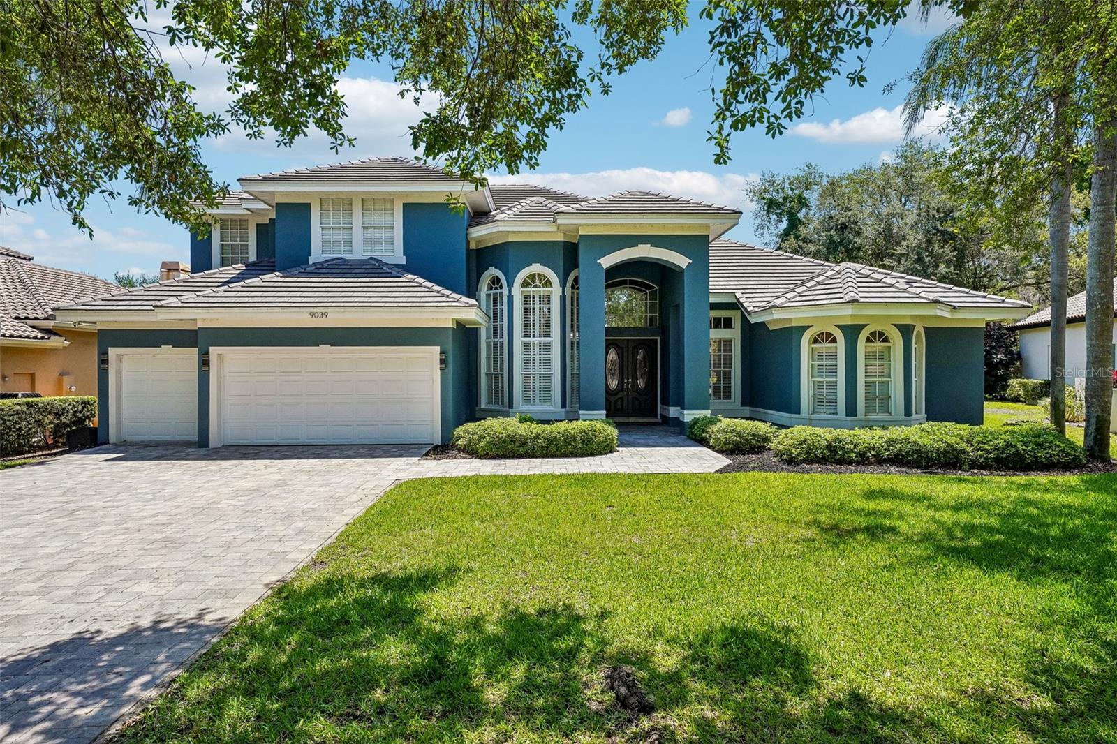Welcome to this stunning executive pool home located in the highly sought-after gated community of Bayou Club Estates. Offering 5 bedrooms, 4 bathrooms, and an oversized 3-car garage, this spacious two-story residence features 3,873 heated square feet designed for both comfortable everyday living and upscale entertaining.Step inside to discover an open and inviting floor plan with soaring ceilings, abundant natural light, and a dramatic loft overlooking the formal dining room and front living area. The desirable split-bedroom layout on the first floor provides added privacy, while the expansive kitchen and secondary living space create the perfect setting for entertaining and family gatherings.The beautifully updated kitchen features quartz countertops, abundant cabinetry, and natural gas cooking for the home chef. Additional major upgrades include a new roof, 1-year-old AC system, tankless gas water heater, and a solar energy system with dual Tesla battery backups — significantly reducing monthly electric costs.Enjoy Florida living at its finest in the refinished inground pool and spa area, with natural gas connected to the spa for efficient year-round enjoyment.Located within the prestigious Bayou Club Estates golf community, residents enjoy 24/7 gated security with on-site guard staff, lush maintained landscaping, and the added benefit of discounted golf club memberships available to homeowners.Conveniently located near award-winning Gulf beaches, shopping, dining, airports, and major commuting routes, this exceptional home offers the perfect blend of luxury, efficiency, privacy, and lifestyle.