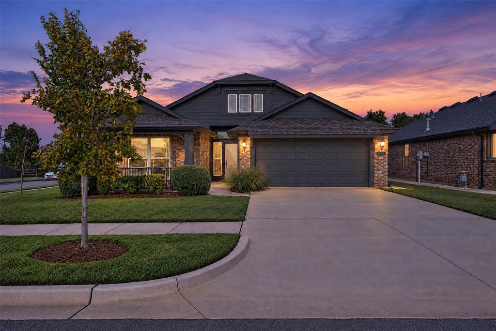 Welcome home to Greenleaf Trails! Built in 2022 as a custom build package with custom upgrades throughout, this beautifully maintained, move-in-ready home offers the feel of new construction with thoughtful improvements already in place. Situated on a desirable corner lot adjoining green space, the home features an inviting open floor plan, vaulted ceilings, and a dedicated home office with a custom built-in library and shelving system.The spacious living area flows into the kitchen and dining areas, creating a comfortable setting for everyday living and entertaining. The kitchen features quartz countertops, a large center island, stainless steel appliances, and abundant cabinetry. The primary suite offers vaulted ceilings, dual vanities, a soaking tub, separate shower, and a walk-in closet upgraded with a custom organization system from The Container Store, providing additional shelving, storage, and hanging space.Step outside to enjoy an expanded concrete patio, perfect for outdoor dining, entertaining, or relaxing. The fully fenced backyard adjoins green space, creating an added sense of openness. These improvements, along with the custom office library, represent approximately $8,000 in homeowner upgrades.Built with energy efficiency in mind, the home features Low-E windows and enhanced insulation for year-round comfort. A transferable limited structural warranty remains in effect through July 2032, subject to warranty terms.Greenleaf Trails offers multiple parks and playgrounds, a splash pad, scenic ponds, recreational fields, and access to Norman's 13-mile Legacy Trail system. Conveniently located near I-35, OU, shopping, and dining. Priced at approximately $175 per square foot compared to a recent 2025-built neighborhood sale at $210 per square foot, this home offers an attractive opportunity to enjoy newer construction, custom upgrades, and wonderful neighborhood amenities!
