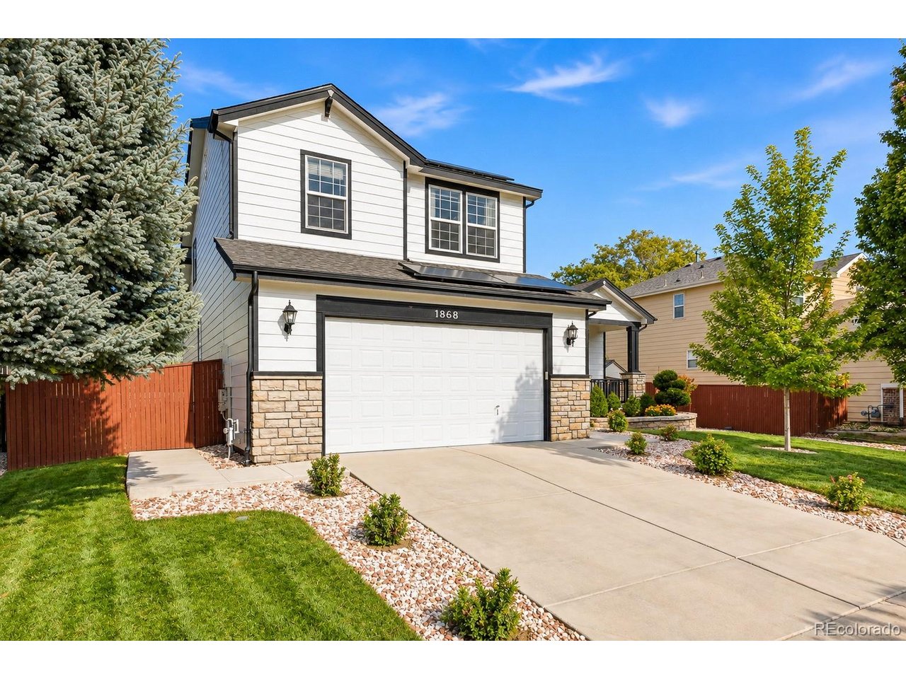 Welcome to 1868 Ute Creek Dr, where thoughtful updates, a spacious floor plan, and an exceptional Longmont location come together! Freshly painted inside and out, this move-in-ready 4-bedroom, 2.5-bath home offers a bright and inviting interior with vaulted ceilings and an open-concept layout designed for comfortable everyday living and entertaining.The updated kitchen features quartz countertops, crisp white cabinetry, stainless steel appliances, a center island, and pantry, opening beautifully to the main living spaces. A highly desirable main-floor primary suite offers privacy and convenience, complete with a spacious 5-piece bath, walk-in closet, and the added luxury of heated bathroom floors.Upstairs, three additional bedrooms provide flexibility for guests, home offices, or additional living space. The unfinished basement offers even more possibilities for future expansion, storage, a home gym, or recreation space.Step outside to a private, beautifully maintained backyard with mature landscaping and a spacious patio-an inviting setting for Colorado evenings, entertaining, or simply relaxing outdoors. Important improvements include a roof approximately 4 years old and central A/C approximately 3 years old, adding even more value to this well-maintained home. Location is another standout: enjoy living in Spring Valley at Ute Creek with Ute Creek Golf Course just a short walk away, plus convenient access to neighborhood parks, open space, shopping, dining, and Longmont amenities. Updated, spacious, and ideally located-1868 Ute Creek Dr is ready to welcome you home.