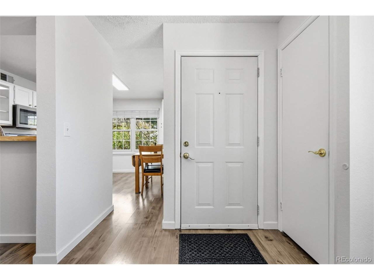 Discover the perfect blend of modern sophistication and suburban convenience in this beautifully refreshed Lakewood residence. Ideally situated with quick access to the boutique shops and dining of Belmar, as well as the Kipling and 6th Avenue corridors, this home offers a lifestyle of total ease. The interior has been thoughtfully transformed with high-quality updates throughout, including stylish new flooring, designer paint, and contemporary window treatments. The heart of the home features an updated kitchen that flows seamlessly into the living area, where premium Renewal by Andersen windows and sliding doors provide exceptional insulation and an abundance of natural light. This layout is uniquely functional, featuring two spacious primary suites that offer maximum privacy and versatility. Every detail has been attended to for peace of mind, with the air conditioning, furnace, and chimney all recently serviced and maintained. All appliances are included, making the transition to your new home entirely seamless. Outside, the community atmosphere shines with a refreshing outdoor pool ready for the warmer months. Nature lovers will appreciate the close proximity to the scenic trails of the Main Reservoir and the expansive open spaces of Sutherland Shire Park. This property represents a rare opportunity to own a turnkey home in a prime location that balances urban accessibility with peaceful outdoor recreation. Whether you are looking for a sophisticated retreat or a home that puts you in the center of it all, this condo delivers on every front.