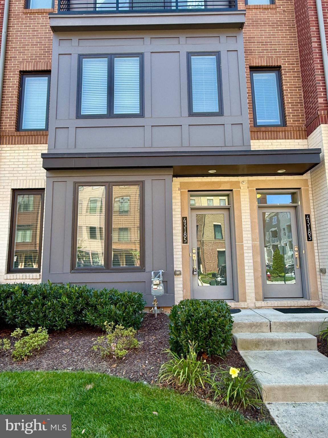 WELCOME HOME! Discover the perfect blend of luxury, convenience, and low-maintenance living in this stunning Toll Brothers HAYES Model located in the highly sought-after Loudoun Valley community. Built with today’s lifestyle in mind, this contemporary 2-story Townhouse-Style Condo offers a Ground-Level Entry, a highly desired NE Front Door Orientation, an attached 1-car Garage, a Private Driveway for an additional vehicle, and abundant unassigned guest parking conveniently located right in front of the home.From the moment you step inside, you’ll appreciate the home’s bright, open, and spacious floor plan, filled with natural light and enhanced by stylish modern finishes throughout. Impeccably maintained and in pristine, move-in-ready condition, this home is ready for its next owner.The heart of the home is the spectacular Gourmet Kitchen, thoughtfully designed for both everyday living and entertaining. It showcases elegant white soft-close cabinetry, gleaming granite countertops, stainless steel appliances, a designer vent hood, generous prep space, breakfast seating, and an open layout that seamlessly flows into the dining and living areas.Upstairs, retreat to the impressive Owner’s Suite, featuring a sophisticated tray ceiling, recessed lighting, a spacious walk-in closet, and a charming private Romeo & Juliet balcony—the perfect place to enjoy your morning coffee or unwind at the end of the day. The luxurious spa-inspired Owner’s Bath features an oversized frameless glass shower, a white dual-sink vanity with granite countertops, and timeless designer finishes.Two generously sized secondary bedrooms with stylish designer light fixtures provide flexibility for family, guests, or a home office. A beautifully appointed hall bath and an upstairs laundry room add everyday convenience.Additional highlights include the highly desirable NE-facing front door orientation, modern neutral décor, and exceptional pride of ownership throughout. Beyond the home itself, you’ll enjoy one of Loudoun County’s most desirable locations. Residents have access to outstanding community amenities, scenic walking trails, playgrounds, swimming pools, fitness centers, and beautifully maintained common areas. Just minutes away, Brambleton Town Center offers an incredible selection of restaurants, cafés, boutique shopping, grocery stores, entertainment, a state-of-the-art public library, parks, and year-round community events—all within walking distance.Commuters will appreciate the unbeatable location with quick access to the Ashburn Silver Line Metro Station, Dulles International Airport (IAD), the Dulles Greenway, Route 267, major commuter routes, and nearby bus service, making travel throughout Northern Virginia and into Washington, D.C., effortless.Situated within the highly acclaimed Loudoun County Public School system, this exceptional home combines luxury, convenience, and an outstanding location into one remarkable opportunity. Don’t miss your chance to own this beautiful Toll Brothers home and experience the very best of Loudoun Valley living! Schedule Your Tour Today!