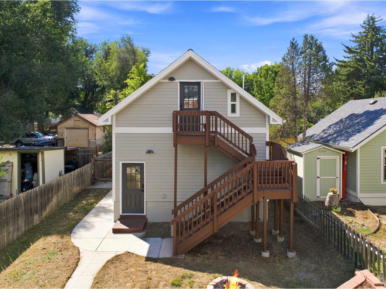 Incredible gem of an opportunity in Old Town Fort Collins! The recently renovated 2 bed, 1 bath bungalow balances historic character with modern amenities, back deck, including a newer Water Heater (2023) and a Metal Roof. Then, there's the studio atop the 2-car garage complete with a bathroom, kitchenette, and separate entrance, all accessible from the alley behind. Property is in the Primary Short Term Rental zone, but you may never want to leave with the walkable distance to Old Town dining and shopping. Pre-Inspected + 12-Month First American Home Warranty for Buyer Peace of Mind! And, the home comes with its own Old Town Links mini golf hole!