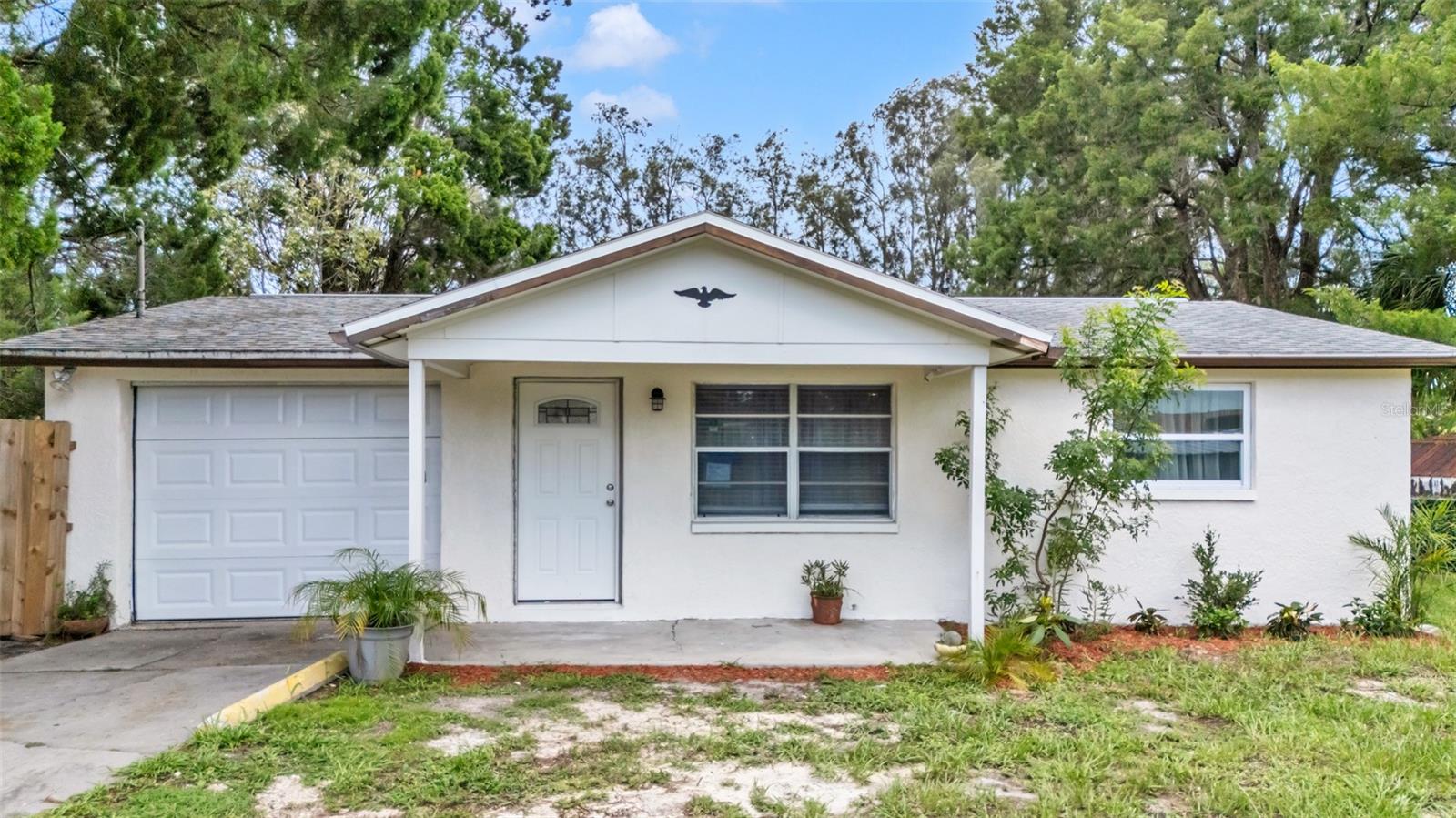 Welcome to this beautiful canal-front fully remodel home in Hudson, Florida with access to the Gulf. The fenced yard and charming porch welcome you into a bright living space with tile floors throughout and new recessed LED lights. The kitchen is brand new and overlooks the canal, and there are two comfortable bedrooms with brand new laminate and 1 full bathroom inside the home. With another partial bathroom located in the garage coupled with the washer and dryer that are also included. Central air ensure year-round comfort with an brand new AC . Also featuring ew duct work and new electric throughout. Enjoy the fenced backyard with stunning water view! Schedule a showing today before it's too late! Close by to shopping, schools, restaurants and much more!