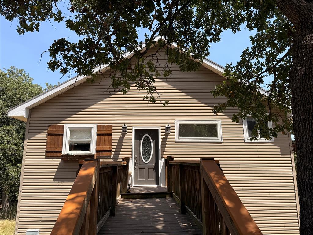 Looking for a tranquil setting where you can sit and enjoy watching the deer and turkey parade through your property? I have the perfect house sitting on 6.89 Acres close to Thunderbird lake. This 3 bed 2.5 bath house has 6 inch thick walls with foam insulation, reverse osmosis system, whole house air purifier, front porch and back deck are made with composite decking. There is also a shop with electricity, some cabinets and work tables.