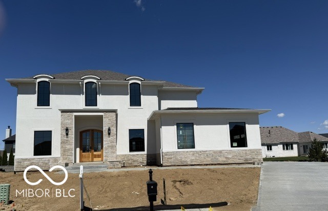 OPEN HOUSE SUNDAY APRIL 12TH FROM 12-2 COME SEE WHAT YOU ARE MISSING!!    Brand new custom construction by Bennett Custom Homes in the desirable Kensington Grove community, this thoughtfully designed home blends modern luxury with everyday functionality. An open, light-filled floor plan welcomes you, featuring a main-level office ideal for remote work and a formal dining room perfect for hosting gatherings. The heart of the home is the expansive chef's kitchen, showcasing an oversized quartz center island, premium finishes, and a stylish coffee and wine bar that flows seamlessly into the living space. Upstairs, the private primary suite offers a spa-like retreat with a massive walk-in shower and generous closet space. Three additional bedrooms are well-appointed and share two full bathrooms. The fully finished basement extends the living space with a dedicated workout room, movie room, an additional bedroom, and a full bath-ideal for guests or multi-generational living. Outdoors, enjoy a spacious porch with ample room to add your dream inground pool and create the ultimate backyard oasis. A stunning new build offering quality craftsmanship, smart design, and timeless appeal.