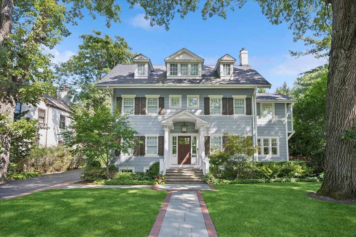Exquisite, like-new home in prime East Winnetka location overlooking the breathtaking Village Green! This classic home has been completely revitalized and enhanced from top to bottom under the expertise of Morgante Wilson (2018), showcasing the highest quality, luxury finishes and timeless design. A truly elegant home spanning over 4,200SF (above-grade) with an ideal floor plan that features generous, light-filled and inviting rooms with a seamless indoor-outdoor lifestyle.  The first floor includes a well-appointed living room with outstanding vistas of the Village Green, an elegant dining room, conveniently located butler's pantry plus private office. The stunning gourmet kitchen features top-of-the-line appliances and fixtures with a perfectly situated breakfast area which opens to the sun-filled family room. A highly desirable mudroom is just off the kitchen.  The second floor offers a fabulous primary suite with luxurious primary bath and wonderful, large closets. Three additional bedrooms and two full baths complete the 2nd floor. The fantastic third floor provides two additional bedrooms and a full bath. The finished lower level offers a spacious recreation room, stylish bar, full bath, laundry room plus abundant storage.  Outside, enjoy an expansive deck and patio, beautifully landscaped grounds plus a newer 2-car detached garage with great storage above. A truly spectacular, turnkey home in the best East Winnetka location - steps from town, train, school, shops and the beach - and sweeping views of the Village Green including nightly sunsets visible from almost every room - a perfect blend of tranquility and accessibility!
