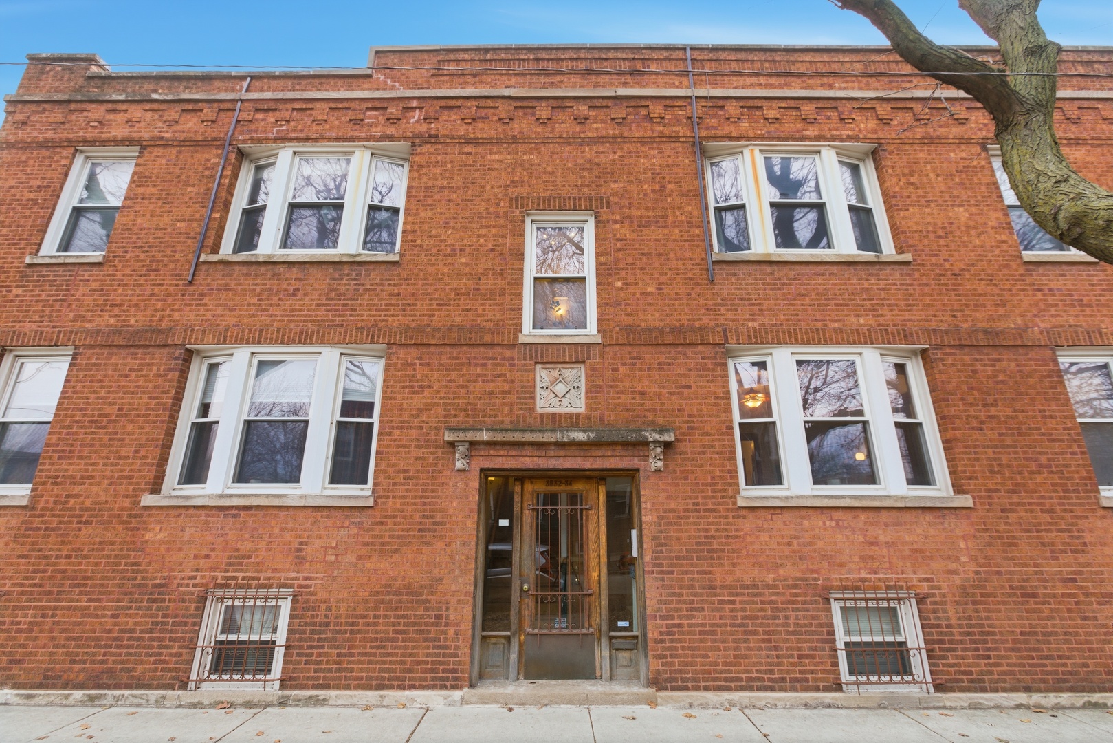 This elevated first floor, 2-bedroom, 1 bathroom condo is nestled on a quiet, treelined street in the heart of Avondale. This inviting home blends classic Chicago character with thoughtful updates and bay windows, allowing natural light to pour in. The condo features hardwood floors, original woodwork, and a spacious kitchen with 42" maple cabinets, stainless steel appliances, walk in pantry, and a beautiful original built-in hutch. Enjoy a private rear deck, in-unit laundry room, and an enormous storage room. Recent updates include a new stove, microwave, dishwasher, and washer/dryer in 2023. Located just steps from the Addison Blue Line, Athletic Field Park, and I-90/94, this home offers unbeatable access to transit, neighborhood amenities, and an easy commute in any direction. Enjoy the best of Avondale which was recently ranked one of the coolest neighborhoods in the world for 2025 by Time Out! The nearby cafes, restaurants, and local favorites make this community so beloved.
