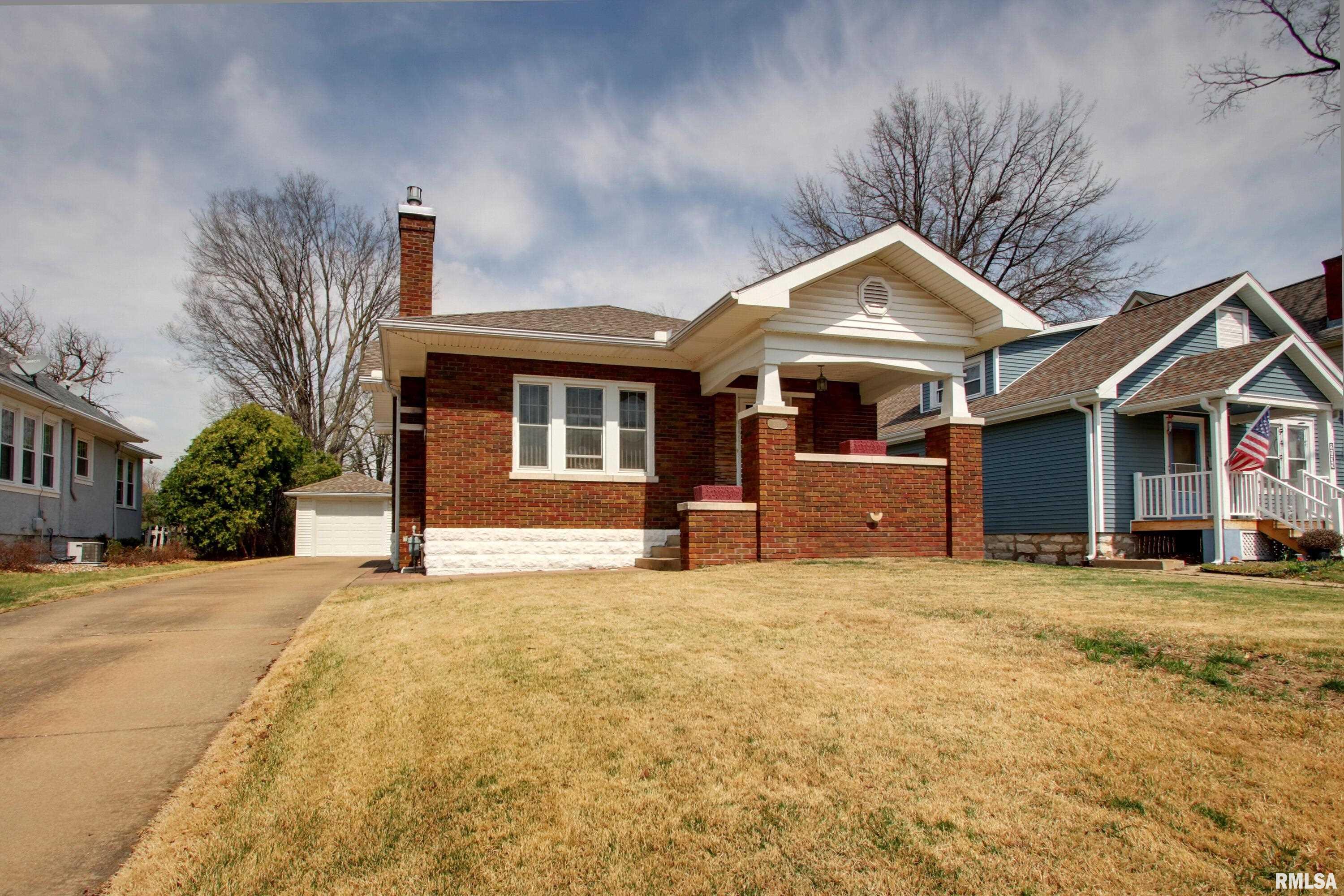 Charming brick bungalow loaded with updates and character! The main level offers 2 bedrooms, while the basement features additional finished rooms which have been used as bedrooms (no egress). Major mechanical updates include a furnace and central air in 2019, water heater in 2017 & roof replaced in 2014. Over the years, the home has also been improved with Pella windows, chimney tuckpointing, a replaced sewer line from the house to the street and an upgraded 200-amp electrical panel. Whole house fan too, if desired. Enjoy relaxing on the inviting covered front porch or entertain on the rear covered deck. Alley access provides convenient off-street parking. A well-maintained home with both charm and important updates already done! Inspections welcome, but selling as-is.   Living & dining room rugs, dining room mounted tv & kitchen tv will convey. Closing to be after 6/10/26.