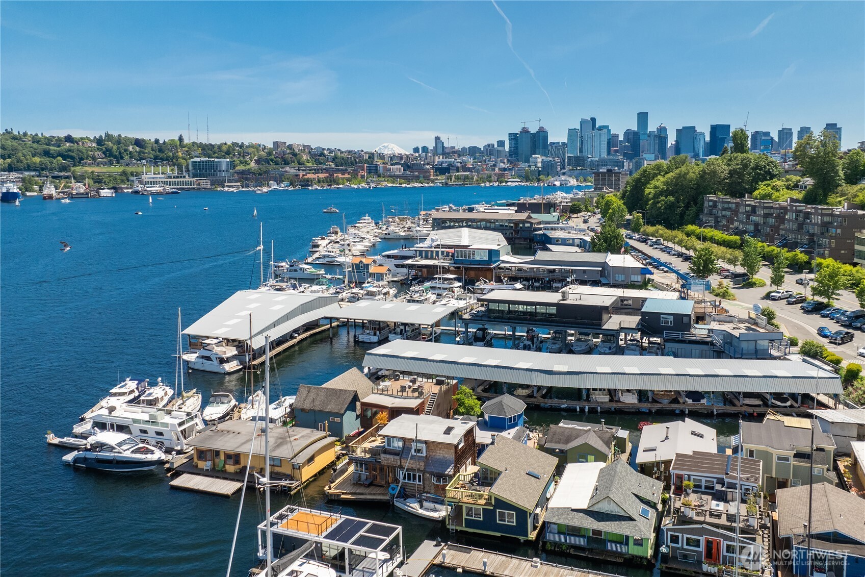 Beautiful Lake Union  floating home with expansive views including Gas Works, Montlake cut and Eastlake. Wonderful spot to entertain! Fabulous upper deck for star gazing and Christmas ships viewing.  Great room has outstanding natural light and high ceilings. Chef's kitchen, SubZero fridge, custom cabinets. Romantic primary with french doors opening to the lake. Mini-splits a/c keep it cool in the summer. Enjoy the  Minutes to the restaurants, tech and UW.  Life on the water is the best! Located on a gated dock with big views and that is very quiet and serene. Welcoming sense of community, Pet friendly, Furniture, appliances, Kitchen gear, deck furniture and paddleboards stay.  Kenmore Air on Lake Union has float planes to the San Juans.