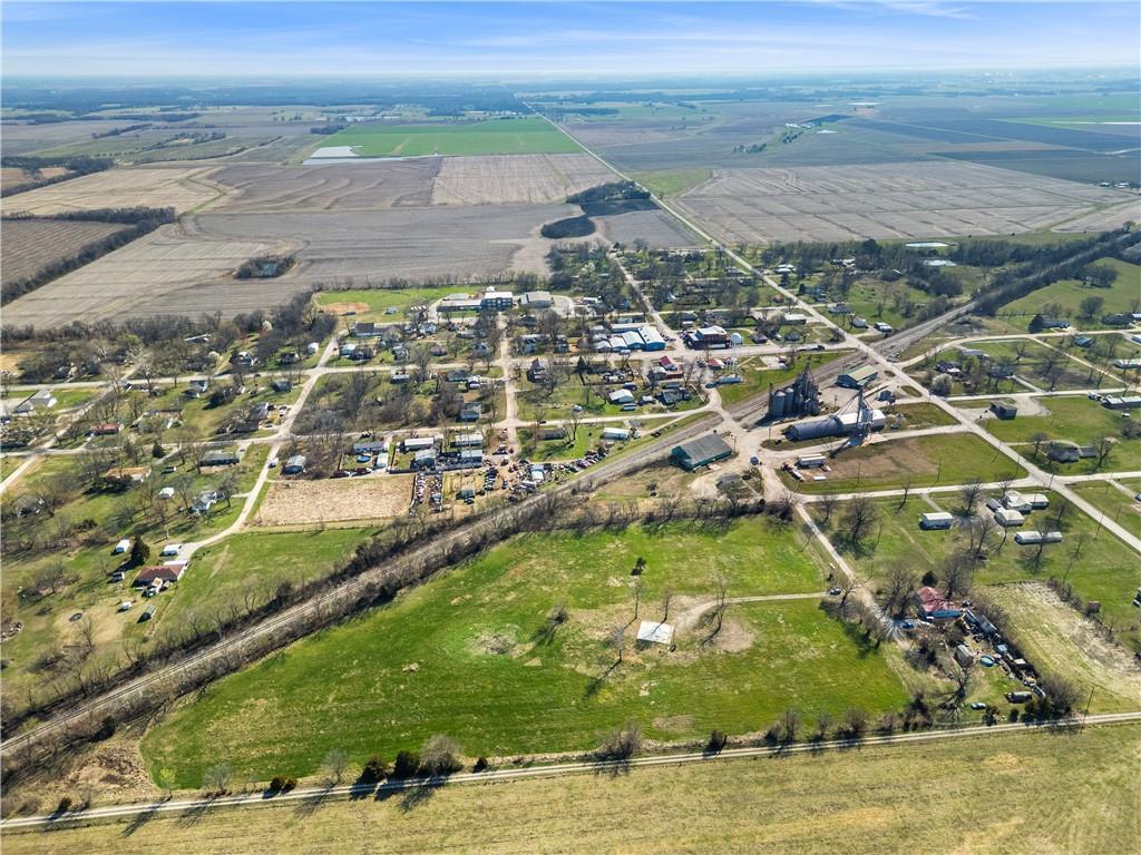 Opportunity to own 8.9± acres on the edge of Walker, Missouri city limits in Vernon County. Positioned between Nevada and El Dorado Springs, this tract offers a convenient location while still maintaining a quiet rural setting.The property features city water, city sewer, electric, and an existing 36x40 concrete pad, providing a strong foundation for future improvements. The open acreage would make excellent pasture ground for livestock and also offers potential for residential development or a country home site.With utilities already in place and usable infrastructure on site, much of the groundwork has been completed. Whether you're looking for pasture, a place to build, or a land investment opportunity, this property offers flexibility with easy access to nearby amenities.Contact the listing agents to schedule your tour.