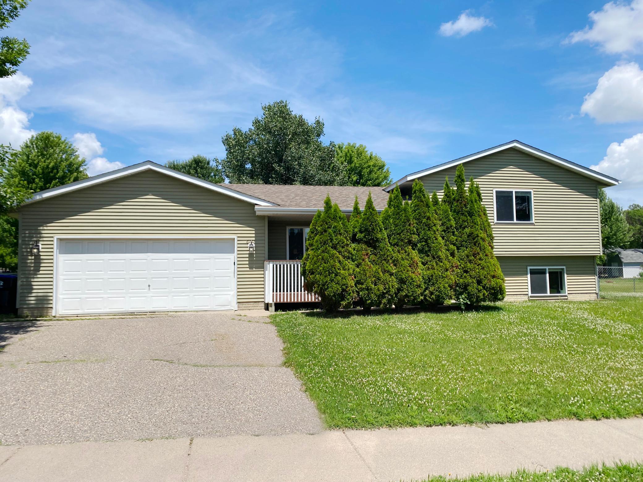 A welcoming three level split with many newer updates. This 3 bedroom, 2 bathroom home has a main level open floorplan with vaulted ceilings, LVP floors throughout living room/dining/kitchen with stainless steel appliances, tile backsplash, informal dining room, insulated and heated garage, a large corner lot with chain link fence. All this and it is also near many of the city of Monticello's amenities, multiple parks, river front, schools, shopping, restaurants and hospital. Some images in this listing have been virtually staged.