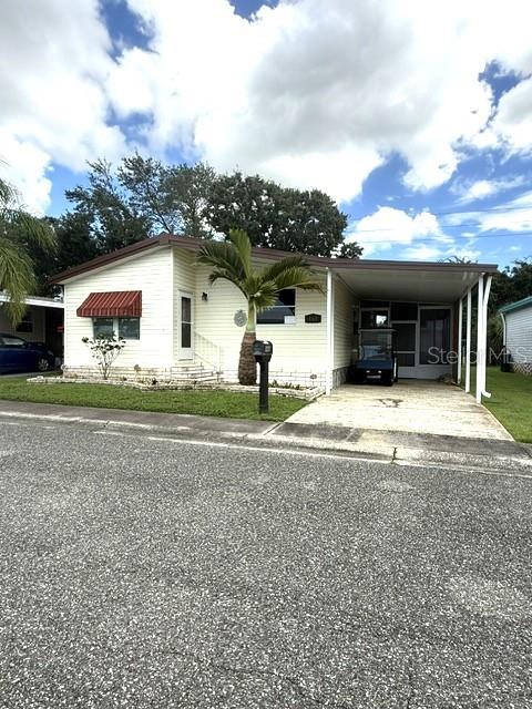 NEWER KITCHEN APPLIANCES-FENCED IN PERIMETER PROPERTY-NO NEIGHBORS AT THE BACK OF THE PROPERTY This property is only a few miles from Clearwater Beach.  Our park, Paradise Island, is sought after because of location to the Beaches, the airport and all major highways. There are too many amenities to list but here are a few.  They include large-heated pool and hot tub that is available 7 days a week, a plethora of clubs that you can join, dances and other planned events.  This is a well-established and maintained park. Here is some additional information on this property. Custom glass windows in patio--Newer washer and dryer--Shingled roof 2012--AC unit 2016 with new Platinum Air filter system 2022--Updated plumbing--Tall toilets--Newer flooring in Living Room, Dining room, Kitchen, Hallway and both bathrooms--Roll-down canvases on carport--All new Kitchen Appliances 2025--This home will come mostly furnished*** for those of you that just want to walk in and start living. The front of the house has the living room, dining room and kitchen, while down the wide hallway you will have the guest bedroom, guest bath, laundry room and across the back of the home is the master suite.  There are 2 main accesses into the home.  The first is through the front door. The other one is through the patio and into the laundry room. This long spacious living room has 4 large windows allowing natural light to flow in and there is access to the hallway and dining roomThere is also a big screen TV already mounted on the wall.  Your dining room is open to both the living room and kitchen.  It has a long table that has seating for 6. This U-shaped kitchen has plenty of counterspace, cabinets and a little breakfast bar at one end and there is a window over the sink so you can see the neighborhood.  This home also has a BRAND NEW REFRIGERATOR, STOVE, AND DISHWASHER THAT HAVE NEVER BEEN USED. The Guest bedroom is a nice sized room with a walk-in closet.  The guest bath is right across the hallway.  It has a tub shower combo, and a tall toilet. The Laundry room has the second entrance into the home entering through the carport and the patio.  It has a 3-door storage cabinet above the newer washer and dryer. The Master bedroom has a 6-piece bedroom set with a Queen size bed and a walk-in closet.  It has a private Master bathroom with a long vanity, tall toilet, a walk-in shower, and three door linen cabinet. The enclosed Patio has tall narrow custom New glass windows. This large space will make for a great relaxing area. There is also an attached shed with a walkway to the backyard.There is a small patio out in the backyard that would be great for a BBQ grill and a couple of chairs to enjoy a cup of coffee while the morning sun comes up.  The beauty of this location is there is no one behind you and it is a fenced in yard which is perfect for your 4-legged fur babies.  This is a very nice home at a great price. Don’t miss the opportunity to own this property. The COOP monthly fees of $461.40 will include: WATER, SEWER--2 TIMES WEEKLY GARBAGE PICKUP--POSTAL DELIVERY TO YOUR HOME --YARD MAINTENANCE--SPECTRUM CABLE & WIFI SERVICE  ** The information provided herein is believed to be accurate, but is not guaranteed**