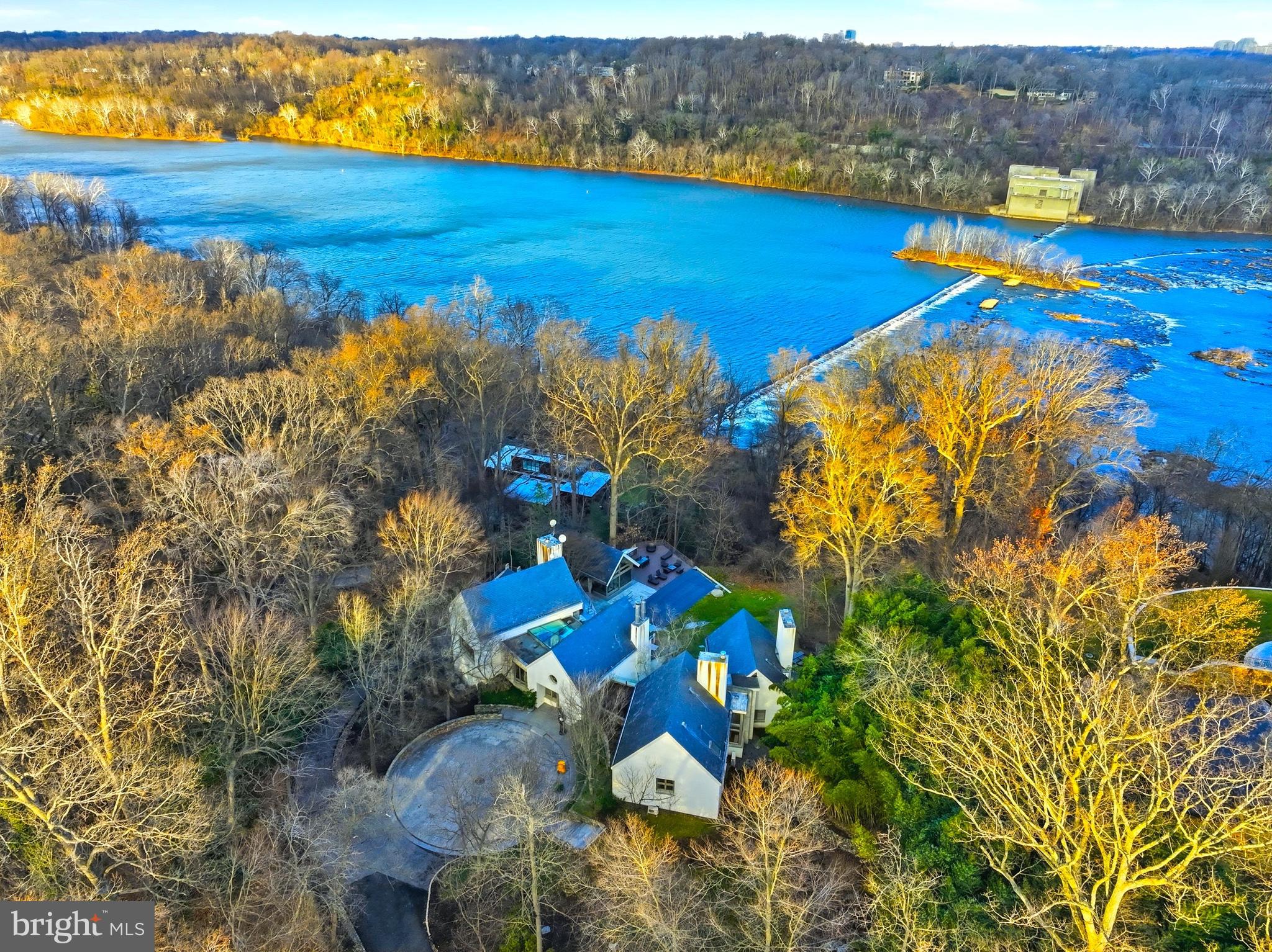 **WATERFRONT ESTATE***THE GOLD COAST OF REVERED MCLEAN, VIRGINIA***This pinnacle estate crowns the hill with UNRIVALED VIEWS OF THE POTOMAC RIVER. SITUATED ACROSS 3.64 ACRES of sculpted land in McLean where LEGACY MEETS LUXURY.  This breathtaking waterfront estate marries TIMELESS ARCHITECTURE with nature in the most beautiful way. OVER 8,000 SQUARE FEET of exquisitely crafted, light filled living spaces that feel both expansive and intimate.LUXURY FINISHES: MASTER-CRAFTED INTERIOR FEATURING A WINE CELLAR, FOUR FIREPLACES, A PRIVATE ELEVATOR, AND A GOURMET KITCHEN.Gracious formal rooms and SOARING WINDOWS THAT FRAME SWEEPING RIVER VISTAS AT EVERY TURN. Outdoors, the property unfolds into manicured lawns and terraces that lead to a show-stopping, RESORT-CALIBER POOL, COMPLEMENTED BY STATE‑OF‑THE‑ART POOL HOUSE BOASTING A PRIVATE GYM WITH A CHANGING ROOM that includes a shower—perfect for your morning laps or lifting sessions without ever leaving the grounds. TOTAL OF 7BR, 7 TOTAL BA (6BA AND 2 HB). Includes HEATED 3 CAR GARAGE and central vacuum. Also, the garage has extra storage room and its own extra washer/dryer. This breathtaking home has SELECTED LIMESTONE, CHERRY WOOD, GRANITE AND MAPLE. Step through and let the VISIONARY FLOOR PLAN pull you into spaces that feel refreshed, new—like nothing you’ve stepped into before. RIVER VIEWS SEEM TO GO ON FOREVER, creating a serene backdrop from dawn to dusk and giving the home a RARE SENSE OF PRIVACY AND ESCAPE WHILE STILL HAVING SWIFT ACCESS TO THE WORLD‑CLASS SHOPPING AND DINING OF TYSONS CORNER CENTER AND TYSONS GALLERIA, AS WELL AS MAJOR COMMUTER ROUTES AND A FEW MILES TO DOWNTOWN WASHINGTON, D.C., CULTURAL LANDMARKS ETC… Live the unparalleled lifestyle along one of the Capital Region’s most exclusive stretches of riverfront. THE LISTING ENCOMPASSES BOTH 1100 AND 1153 CREST LANE THAT ARE 2 LOTS CONSOLIDATED INTO A TOTAL OF 3.64 ACRES OF PRIME RIVERFRONT GRANDEUR.  Please note, showing is by  appointment with 24 hour notice. https://view.spiro.media/1100_crest_ln-778https://view.spiro.media/1100_crest_ln-778