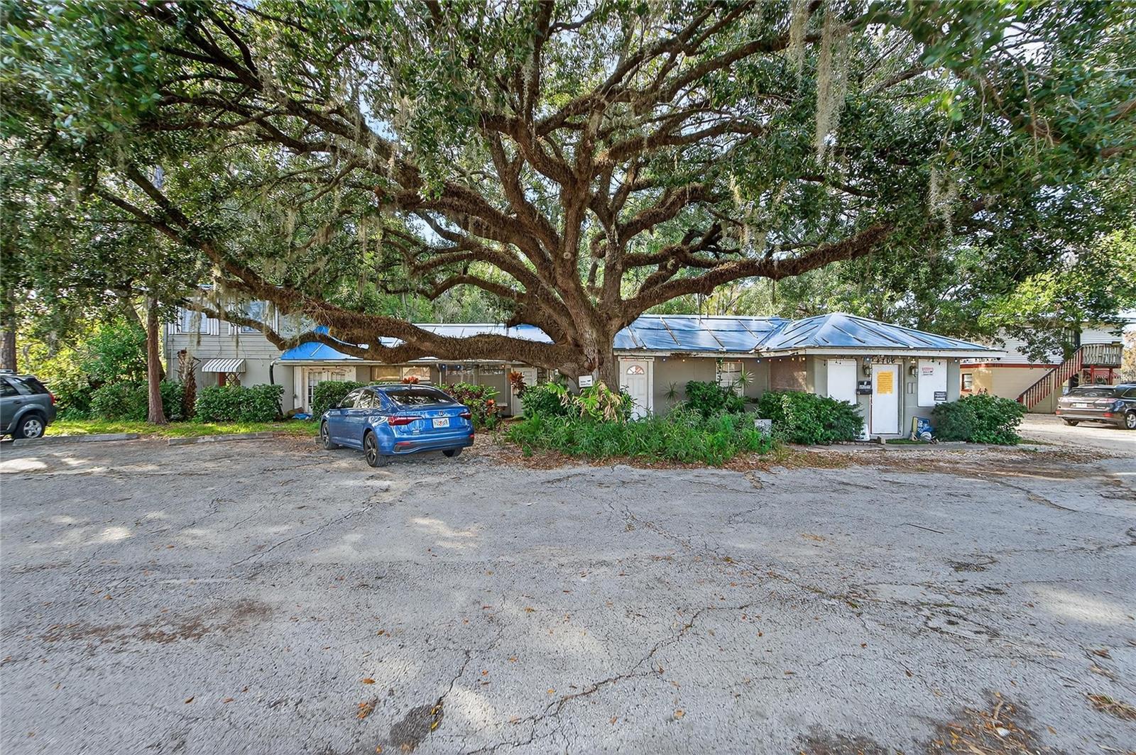 Opportunity like this does not come along often. Situated on 4701 Land O' Lakes Blvd (US Highway 41), this high-exposure, C-2 Zoned commercial property sits directly on one of the busiest and most traveled corridors in Land O' Lakes-making it an absolute magnet for investors and savvy buyers. The property features an apartment building with seven units with a mix of one-bedroom and studio apartments.  It also features and office, storage, and a laundry facility.What truly sets this property apart is its unmatched visibility, prime street frontage, and versatile mixed-use zoning. Whether you choose to continue operating it as a multifamily investment or capitalize on the zoning for redevelopment, the possibilities are nearly endless. Future uses could include a restaurant, coffee shop, grocery store, car wash, retail, or service-bases business, all perfectly positioned to thrive on the constant traffic along busy US-41.This property can be purchase separate, or four other parcels of land equalling 2.13 acres with 303 prime commercial frontage can be purchased together as cross listed in MLS #TB8462872. If all parcels were purchased, you would gain an additional 6 waterfront one bedroom units built in 1976.This is a rare chance to secure a high-demand commercial asset in a rapidly growing area with exceptional accessibility. Act now, schedule your showing today, and stake your claim in one of Land O' Lakes most desirable locations.