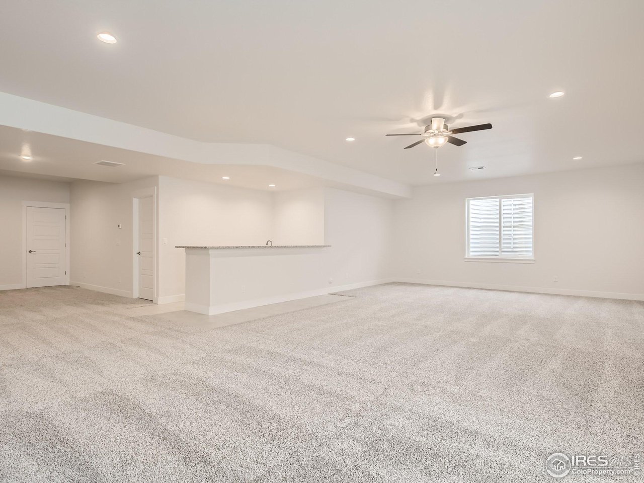 Bring the whole family to this beautiful move-in ready single-story home! Designed with an open-concept layout, this home offers a bright and spacious living area perfect for everyday living and effortless entertaining. The gourmet kitchen features a gas cooktop, stainless steel vent hood, built-in double ovens and microwave, and a large quartz island with seating - ideal for casual meals or hosting guests. Unwind in the inviting family room, complete with a cozy fireplace and plenty of natural light. Your private owner's suite is a true retreat, showcasing a tray ceiling with ceiling fan, expansive walk-in closet with built-in organizer, and a luxurious bath with double-bowl vanity, walk-in shower, soaking tub, and linen closet. Two additional bedrooms with walk-in closets and a dedicated office with elegant French doors provide both comfort and functionality on the main level. The finished basement is perfect for entertaining or family fun, featuring a spacious recreation room, wet bar, full bath, and two additional bedrooms. You'll also find an oversized unfinished area-ideal for a workout space, hobby room, or extra storage. This home comes complete with front and backyard landscaping, a 6' privacy fence, window coverings, and a 3-car tandem garage. With plenty of space for everyone, this American Legend Home blends luxury, comfort, and convenience-all ready for you to move right in!