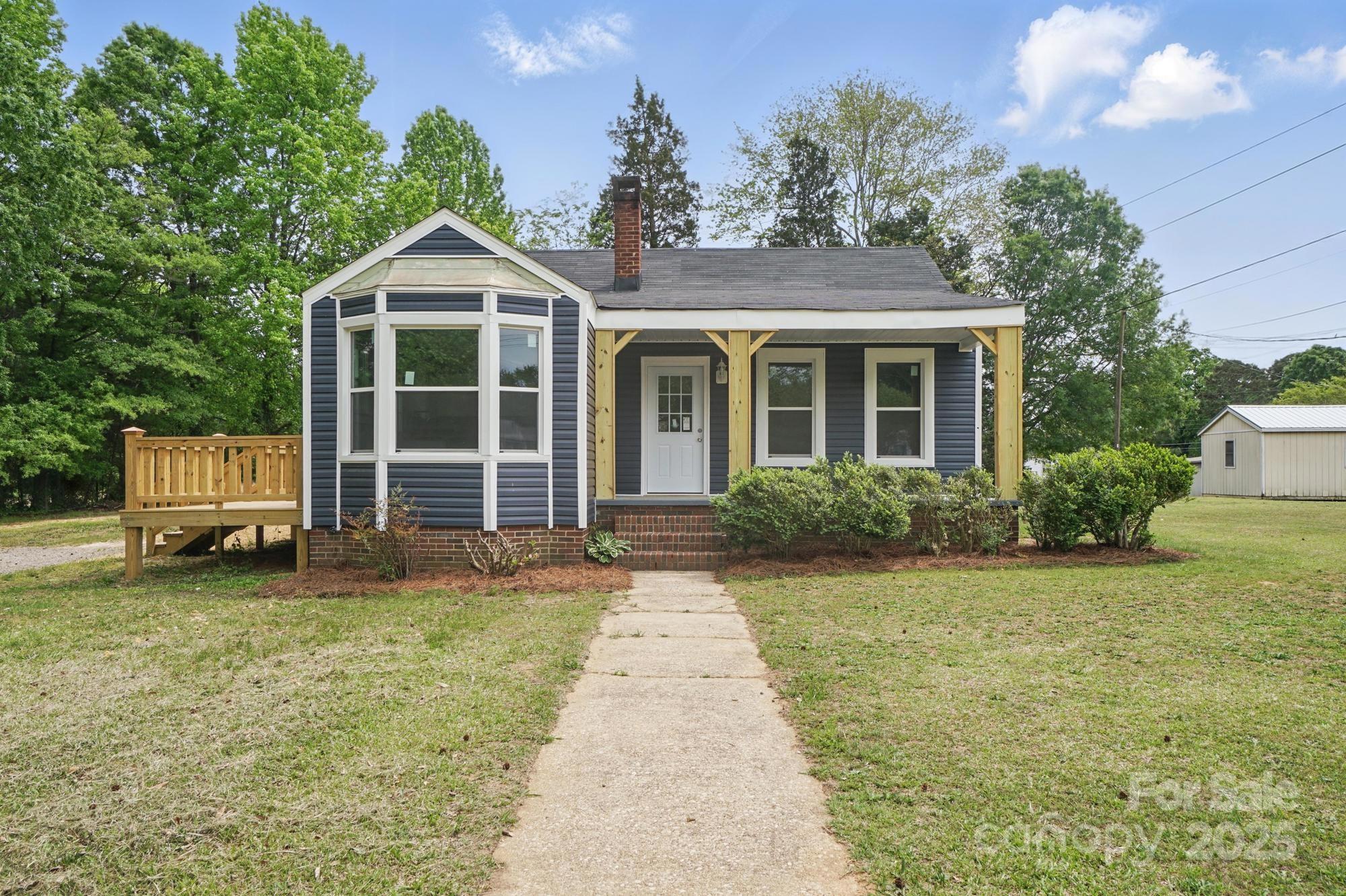 Big things come in small packages. Charming, newly renovated home in Kannapolis! This gem features brand new LVP flooring, new carpet, new updated lighting, and fresh paint throughout. The modern kitchen boasts granite countertops, stainless steel appliances, and a sunlit breakfast nook. Enjoy the spacious backyard with a newly built deck perfect for relaxing or entertaining.