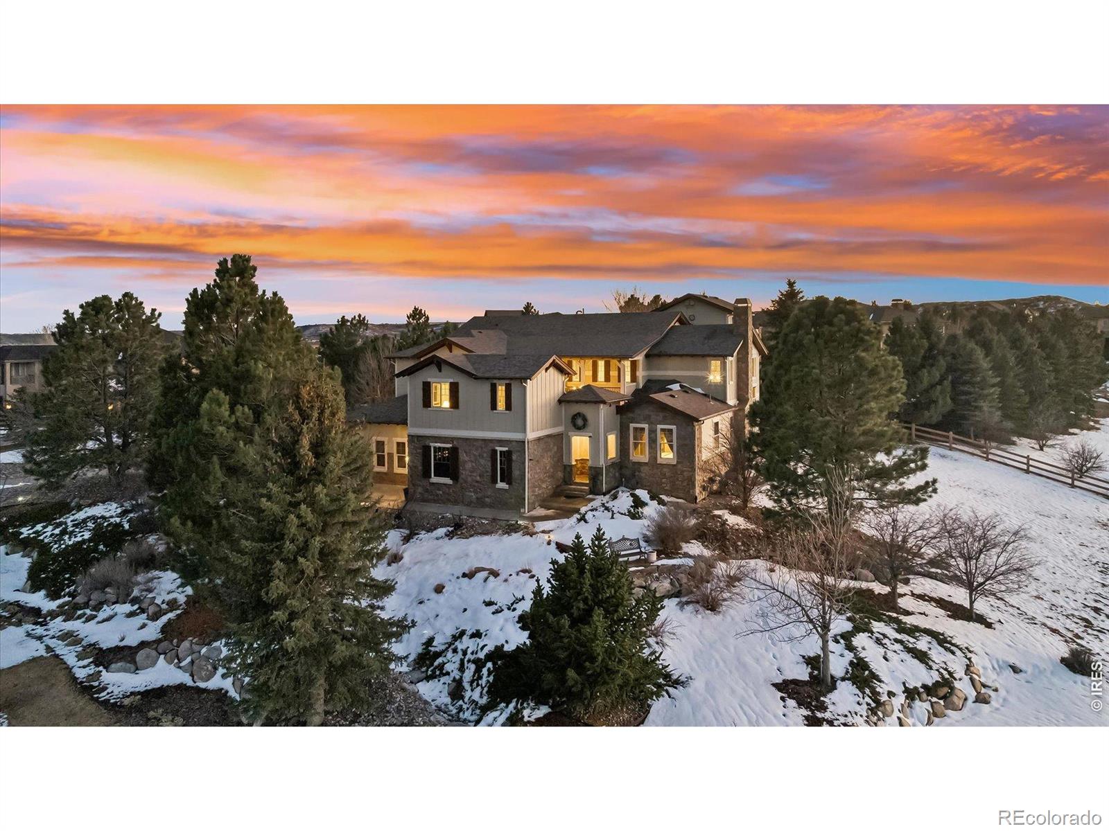 Nestled on a prominent homesite in the prestigious Pradera golf community, this extraordinary former Joyce Homes showhome offers great value and luxury living on nearly one acre with breathtaking neighborhood and mountain views. This residence is in a league of its own, spanning approximately 6,400 square feet and showcasing exceptional craftsmanship, designer finishes, and high-end upgrades throughout. This custom home features 6 spacious beds and 6 baths, providing ample room for both everyday living and entertaining. Rich reclaimed wood floors, elegant stone finishes, and wrought iron accents add warmth and lend truly distinctive character. At the heart of the home is an expansive family area with a cozy fireplace and wet bar, flowing into a chef-inspired kitchen equipped with high-end stainless steel appliances, a pantry, and generous workspace. Large windows capture natural light and scenic views, while multiple gathering spaces create a welcoming environment for hosting guests or relaxing with family. The spacious master suite offers a 5-piece bath with coffee bar, his and hers closets, and a treetop sitting area and deck with private hot tub! 3 secondary beds, 2 more baths, and a family loft area completes the upper level. The lower level includes an amazing wine/whiskey tasting room, a guest bed/bath, and large exercise and theater rooms. Step out front to enjoy a private courtyard with a fireplace and snow-melt system, perfect for year-round Colorado outdoor living. The property also includes a separate casita over the garage, offering the ideal space for a private office. Located in a quiet luxury neighborhood with golf, swimming, tennis, and access to open space, as well as top Douglas County schools, this remarkable estate blends timeless design, privacy, and convenience in one of Parker's most desirable communities. You won't see anything else like this rare gem in the market today-take a tour before this impressive property is gone!