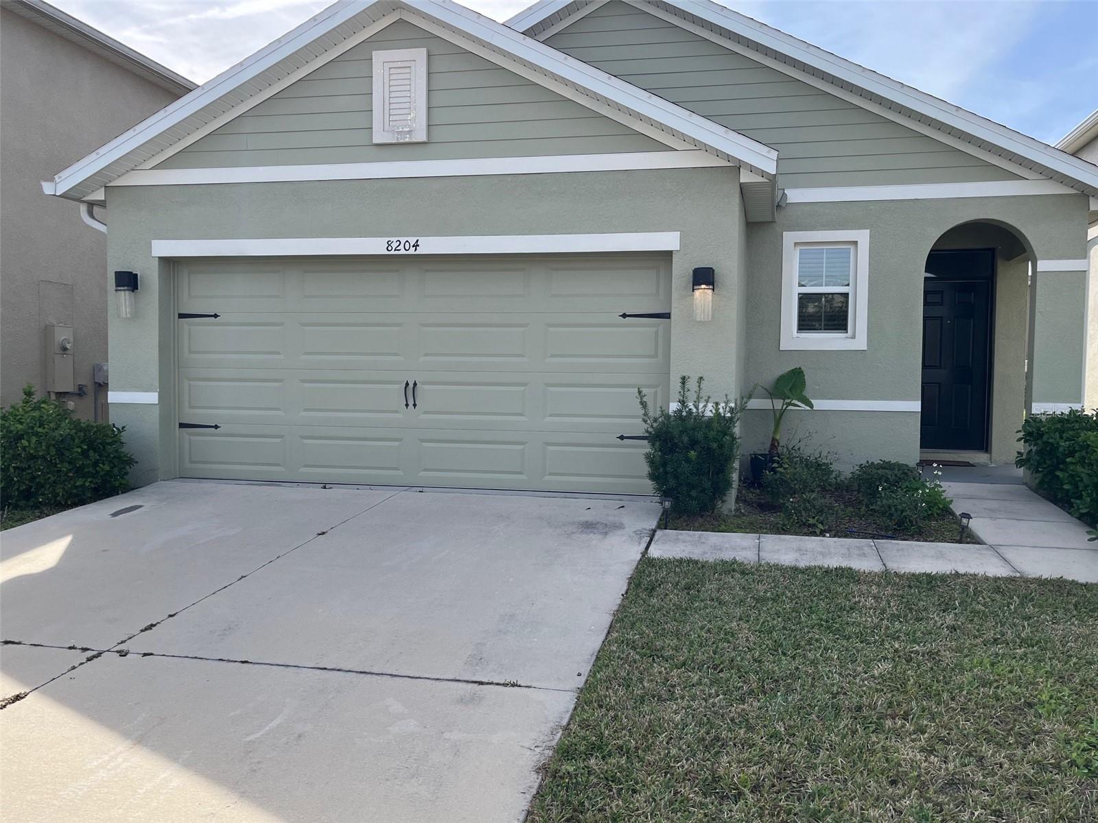 If you thought an affordable, single family home in an engaging lifestyle community was out of reach, you need to see this! Take a short stroll or bike ride to renowned and world class Crystal Lagoon from your comfortable, well planned 3/2 in Epperson Ranch South. The flowing floor plan features ample living space, a formal dining area and split bedroom plan. Move in ready, this delightful space features new carpet, shimmering lighting throughout and a nicely equipped kitchen with granite countertops and full appliance package. You'll also appreciate the primary suite's well organized walk in closet as well as a separate inside laundry room with included washer and dryer. Water filtration system and softener are also included. The Crystal Lagoon turns everyday living into a vacation with its vibrant blue water, sand beaches, kayaking, paddle boarding swim up bar and restaurant and more. Visit their website at metrolagoons.com/epperson-lagoon-wesleychapel.