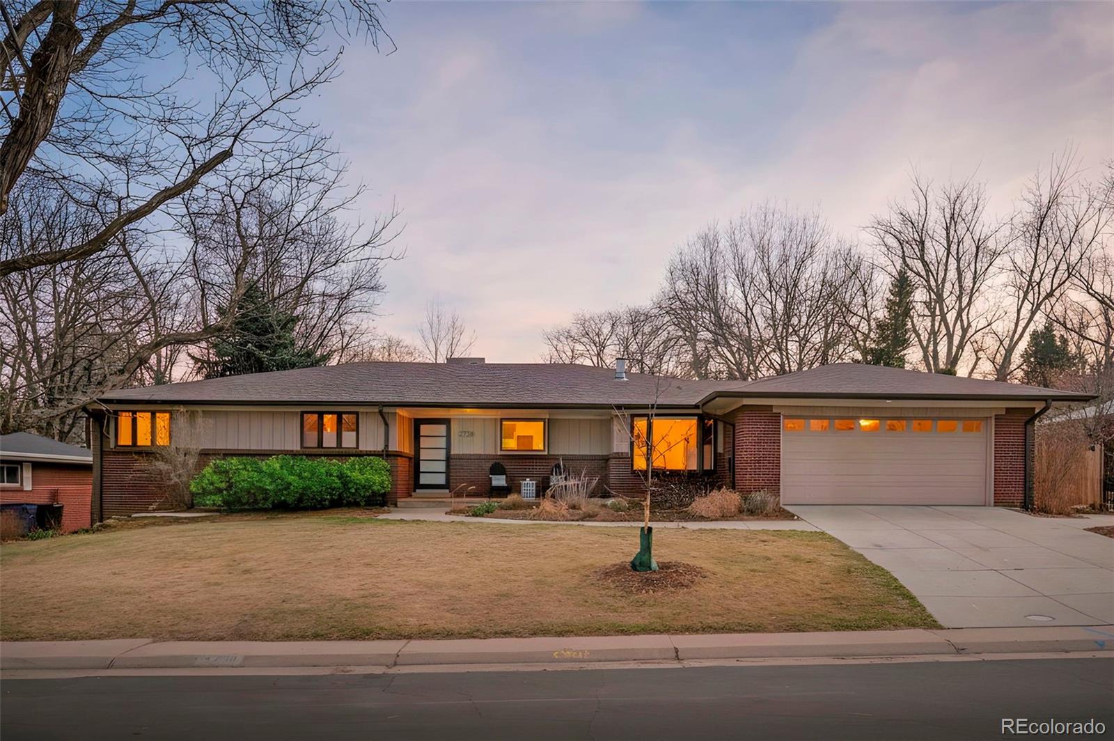 Beautifully updated & meticulously maintained, this classic Southern Hills ranch is just a stone’s throw from McWilliams (Dinosaur) Park and feeds into coveted Slavens K-8. A thoughtful recent refresh brings renewed energy to an already exceptional home. Fresh paint, updated fixtures, new hardware throughout, and a striking staircase to the basement, enhanced by a wooden railing with wrought iron balusters, makes an immediate impression. Rich hardwood floors, a statement flagstone fireplace, a charming bay window, and curated lighting establish a warm, elevated feel on the main level. Comfort meets efficiency with an integrated flush-mounted mini-split system on the main floor, delivering modern climate control without compromising aesthetics. The gourmet kitchen is a true centerpiece showcasing high-end granite countertops, Thermador and SubZero appliances, custom Crystal cabinetry, and an expansive center island; all complemented by an adjacent mudroom/laundry for seamless daily living. Three spacious main-floor bedrooms include a tranquil primary suite with generous closet space and updated spa-like bath that features an oversized walk-in shower. The finished basement expands living/entertaining possibilities with a stylish wet bar, beverage fridge, and media area — alongside an enormous guest bedroom or bonus room with a private bath & walk-in shower. The utility room & crawl space provide outstanding storage, and the garage offers a newly refinished floor, flexibility for gear, toys or an additional workspace. A quiet oversized lot, extended covered patio, and mature landscaping front and back create an inviting setting for relaxing, playing, or hosting. New soffits, fascia, and recently installed gutters w/leaf guards add function and peace of mind. An unmatched location  - close to Observatory Park, Slavens Elementary, and minutes from vibrant dining and shopping in Cherry Creek, DTC, DU, Swedish Medical Center & University Hills. This is your new home!