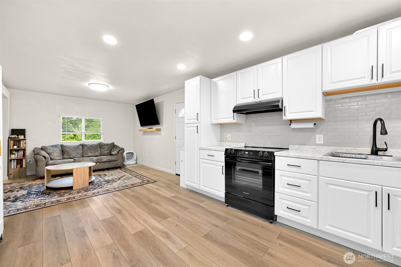 Beautifully remodeled and move-in ready! Welcome to this tastefully updated 2-bedroom, 1-bath home in Maple Leaf Village, a peaceful all-ages community in Blaine. Thoughtfully renovated throughout, this inviting home features a stunning new kitchen, beautifully remodeled bathroom, updated flooring, modern fixtures, and an energy-efficient ductless heat pump with year-round heating and air conditioning. Enjoy a welcoming front porch, garden area, and storage shed. Conveniently located just minutes from Birch Bay, downtown Blaine, I-5, shopping, dining, parks, beaches, and the Canadian border, this home offers affordable, low-maintenance living in a fantastic location. Buyers to verify park rules, space rent, lot lease terms, and park approval requirements.