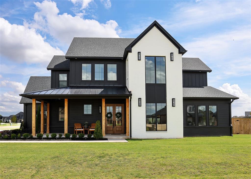This exceptional custom home was carefully curated with intentional design, timeless architecture, and craftsmanship rarely found in today's market.Situated on a premium 1-acre corner homesite in the prestigious gated community of Addington Farms, this 4-bedroom, 3.5-bath residence offers 3,574 sqft of thoughtfully designed living space. A dramatic two-story foyer welcomes you with a grand staircase and a statement chandelier. A dedicated office with custom judge’s paneling and French doors provides a refined workspace. Throughout the home, you’ll find 7-inch solid white oak flooring, soaring 10-foot ceilings, 8-foot doors, wood beams, black windows, custom millwork, and beautifully executed color-drenched designer rooms.The chef's kitchen was designed for entertaining with a professional-grade white Cafe appliance package, including a 42" gas range, double ovens, built-in refrigerator, pot filler, custom brick vent hood, farmhouse sink, ceiling-height cabinetry, and a beautifully appointed butler's pantry.The first-floor primary suite offers a spa-inspired retreat with a freestanding soaking tub, curbless glass shower, custom walk-in closet, and luxurious designer finishes. Upstairs features a spacious bonus room, three additional bedrooms with custom walk-in closets, two full bathrooms, and over-the-garage unfinished walk-in attic space ready for future expansion.Outside, enjoy a fully fenced 1-acre backyard with irrigation, dedicated garden area, covered patio, extended entertaining space, and a wood-burning fireplace with gas hookup.Additional features include epoxy garage floors, custom garage storage, whole-home water filtration and softener, hardwired security cameras, security system, and exceptional craftsmanship carried consistently throughout every room.This is more than a custom house, it's a thoughtfully designed masterpiece where every finish was selected to create a timeless, cohesive luxury living experience.