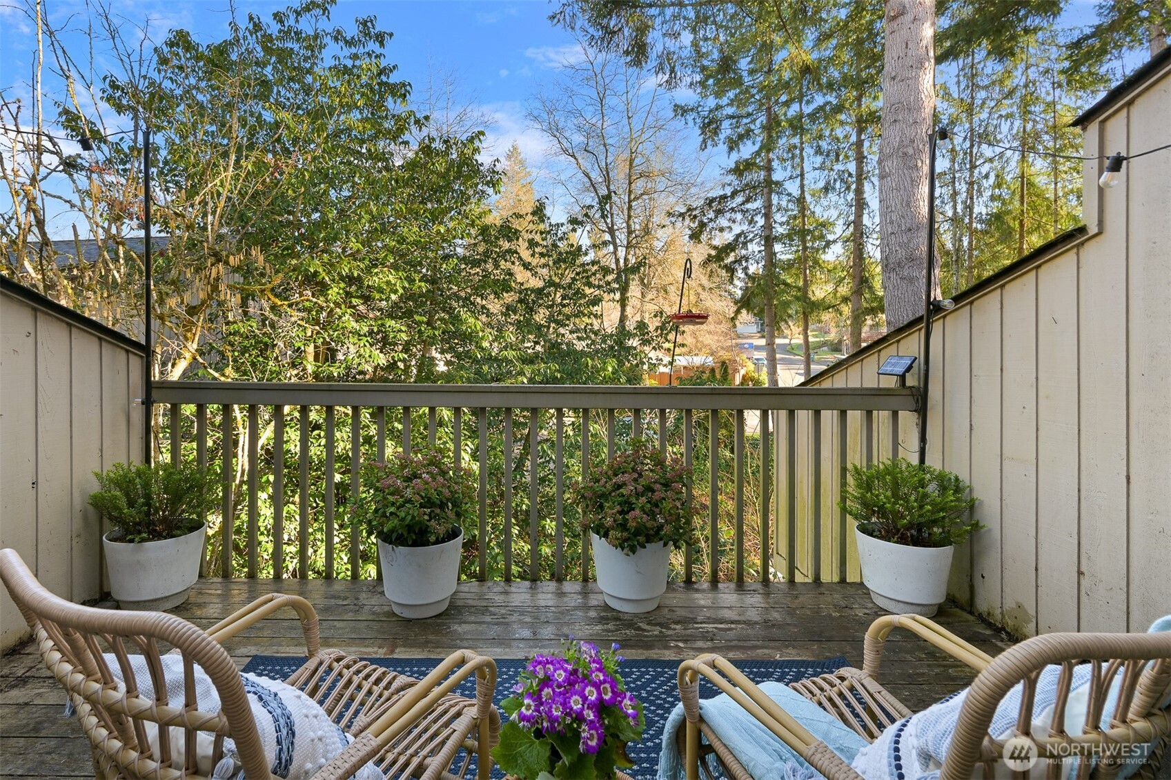 Creekside retreat just steps from everything! This wonderfully updated condo offers the best of Pacific Northwest living with an unbeatable proximity to Galbraith Mountain and Whatcom Falls Park. The main level showcases a welcoming living space with a beautiful remodeled kitchen, cozy wood-burning fireplace and private deck overlooking the creek. Upstairs features two bedrooms, including a primary bedroom and an updated full bath. The lower level adds incredible versatility with a third bedroom boasting creek views, a generous flex space perfect for separate living, gear storage, office, or workout area and an oversized closet. Close to trail access, downtown, shopping and schools. Step outside to explore, and come home to unwind.